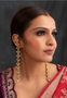 Party wear oversized Lomg earrings with gold finish