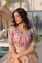 Model wearing sindur silk lehenga with embroidered shrug