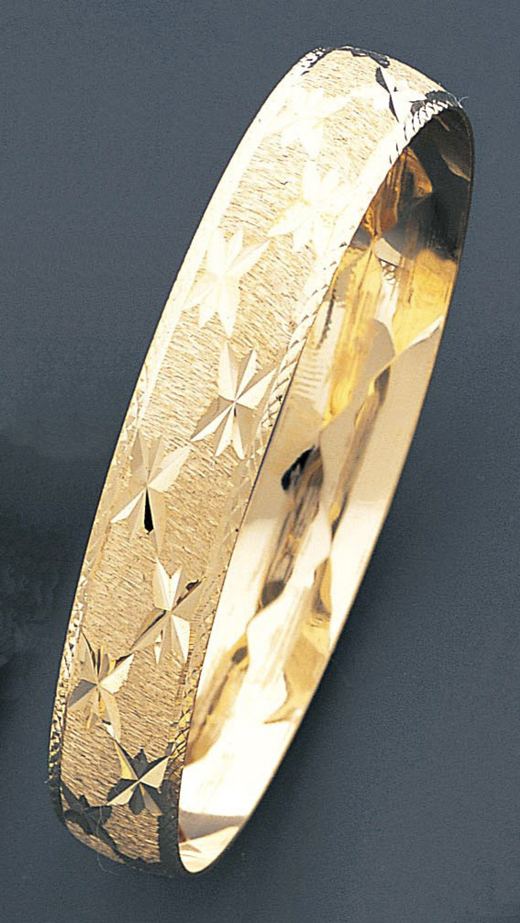 14k Gold 12mm Wide Star Pattern Engraved Slip-on Solid Bangle 7 Inches 14k Gold 12mm Wide Star Pattern Engraved Slip-on Solid Bangle 7 Inches