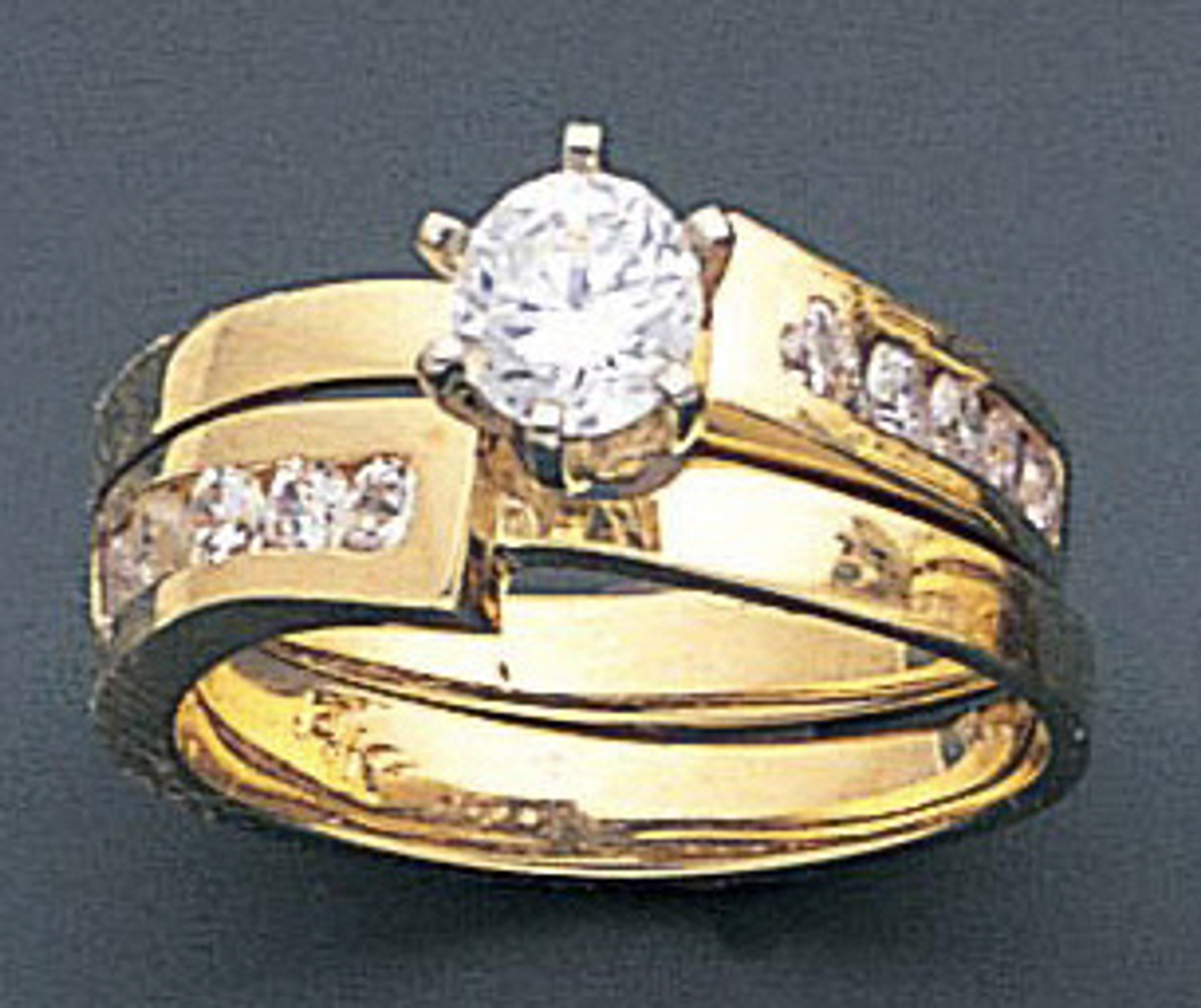 14k Yellow Gold 9mm Wide 0.85ct. Round Cubic Zirconia Wedding Set 14k Yellow Gold 9mm Wide 0.85ct. Round Cubic Zirconia Wedding Set