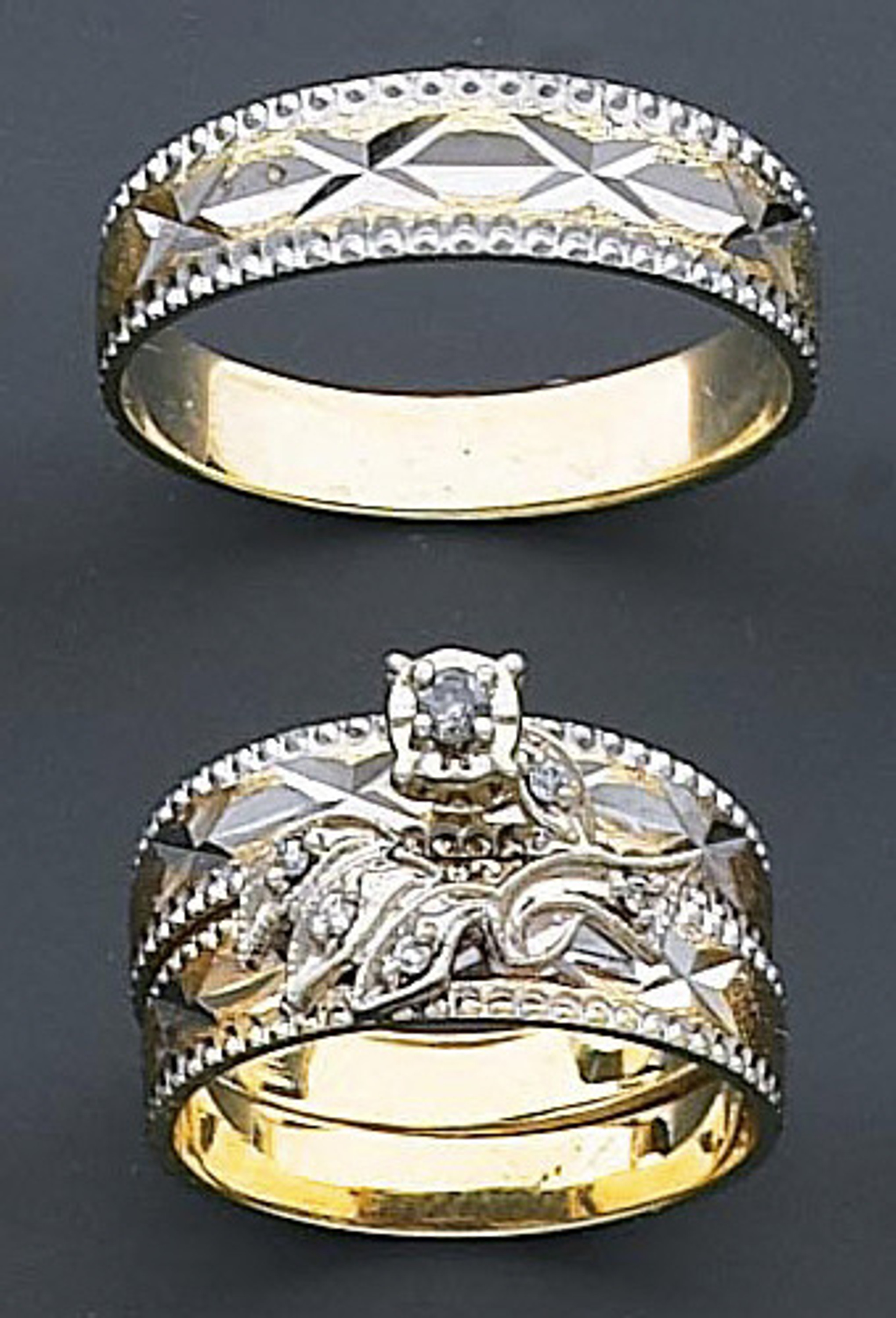 14k Gold 6mm His & 10mm Her's Wedding Ring Set With Star and X Pattern 14k Gold 6mm His & 10mm Her's Wedding Ring Set With Star and X Pattern