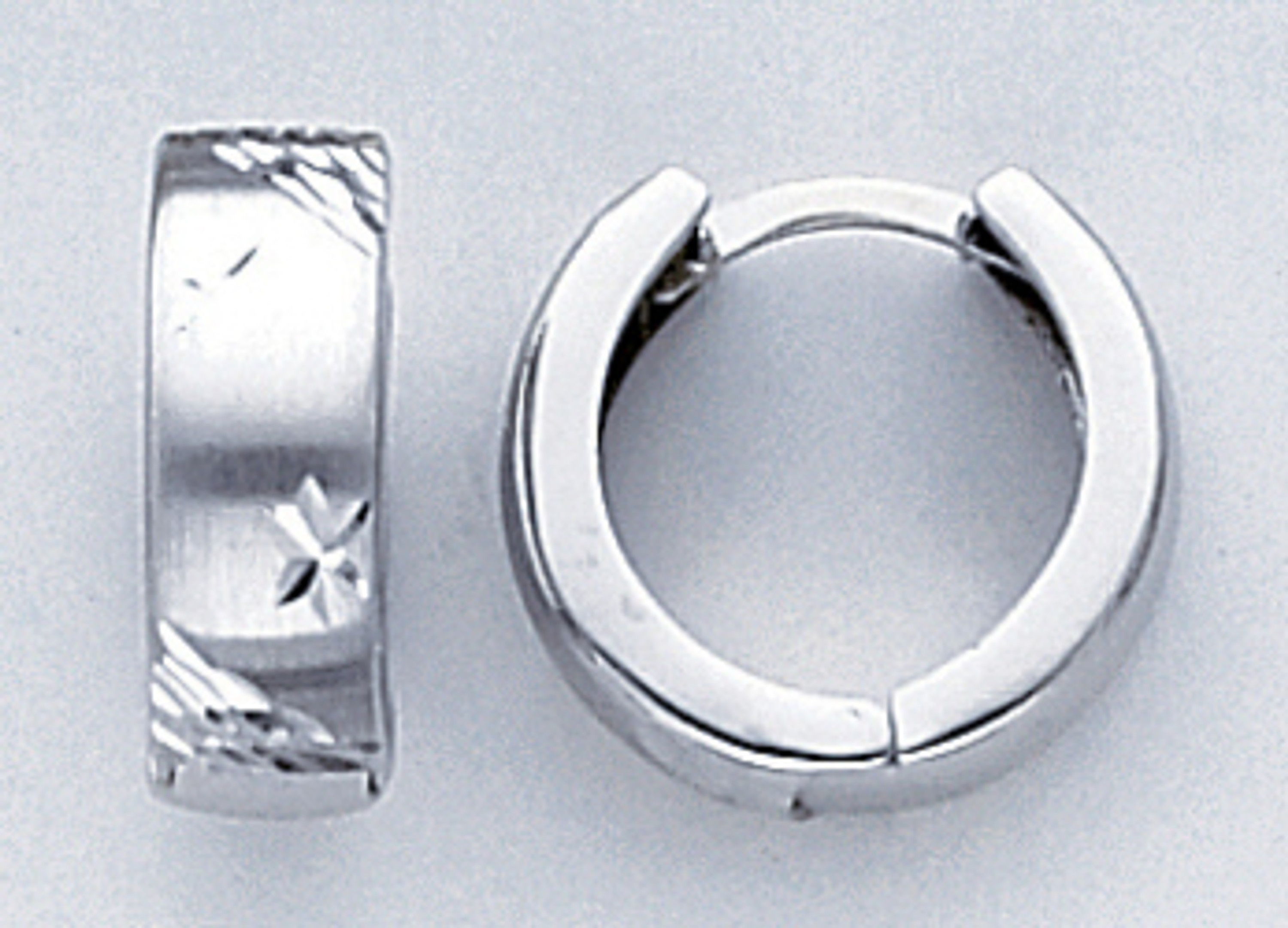 14k White Gold 15mm Huggies Earring. 14k White Gold 15mm Huggies Earring.