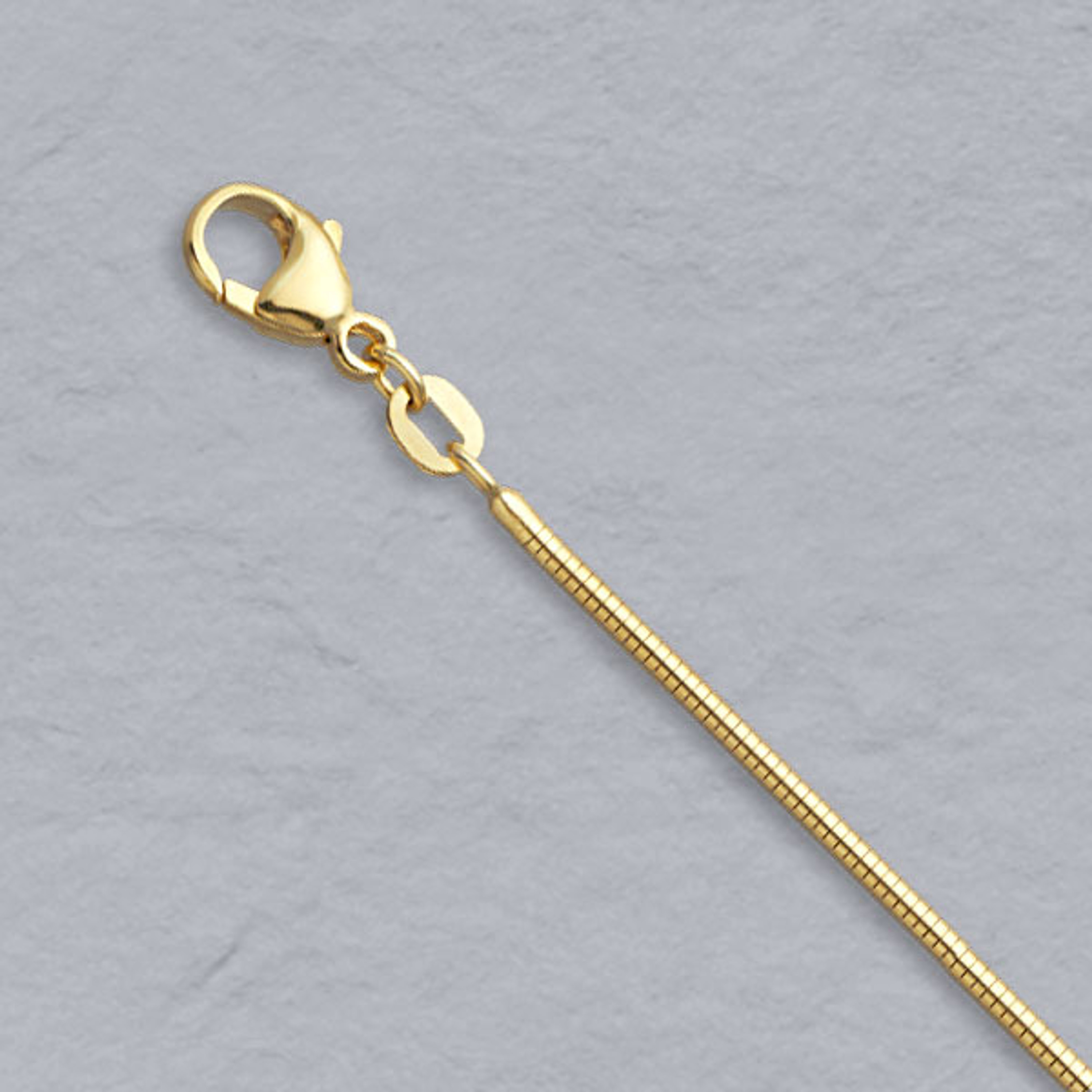 18K Yellow Gold 1.6mm Round Snake Chain 18 Inches 18K Yellow Gold 1.6mm Round Snake Chain 18 Inches