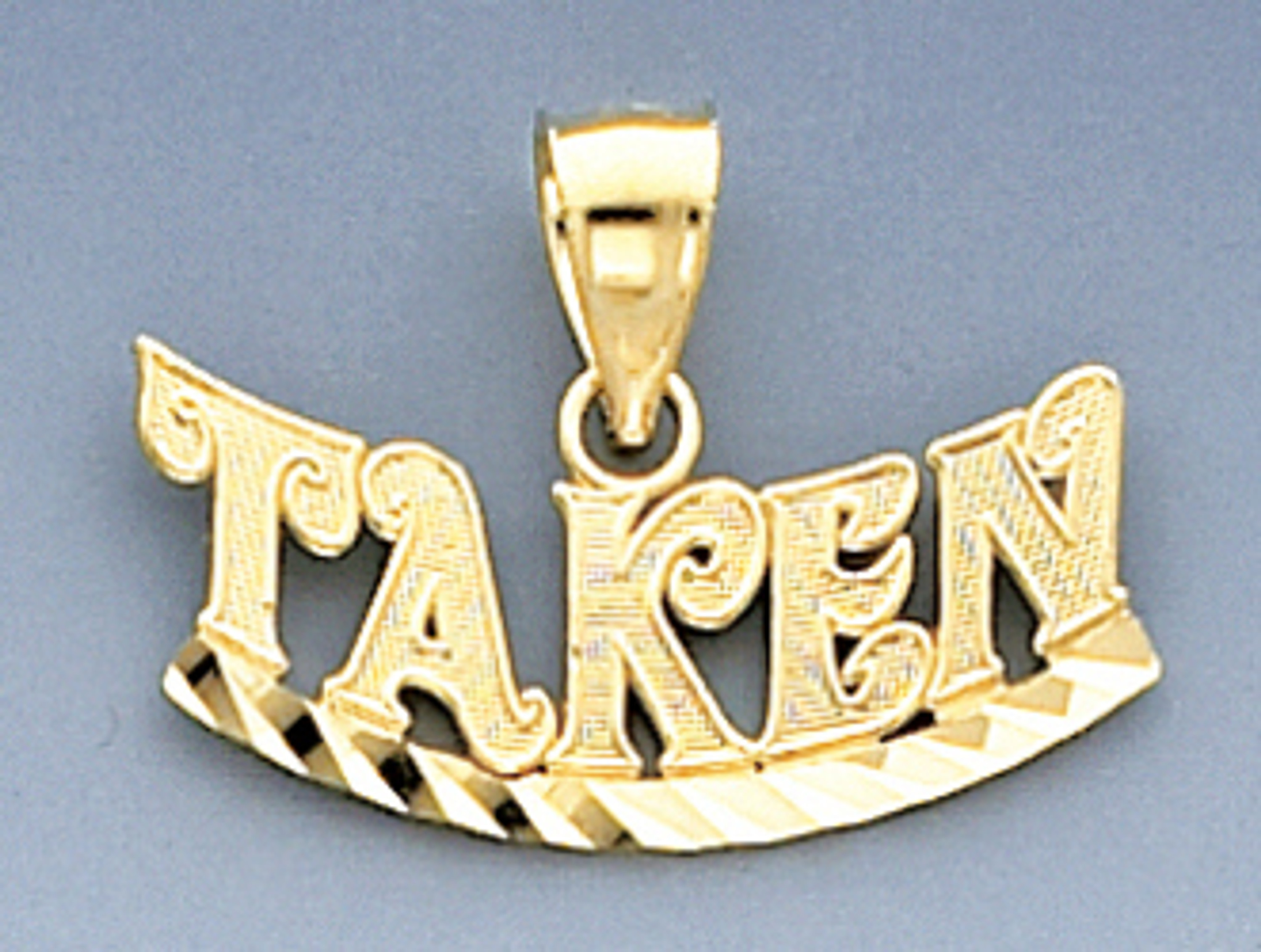 14k Gold Taken Charm. 14k Gold Taken Charm.