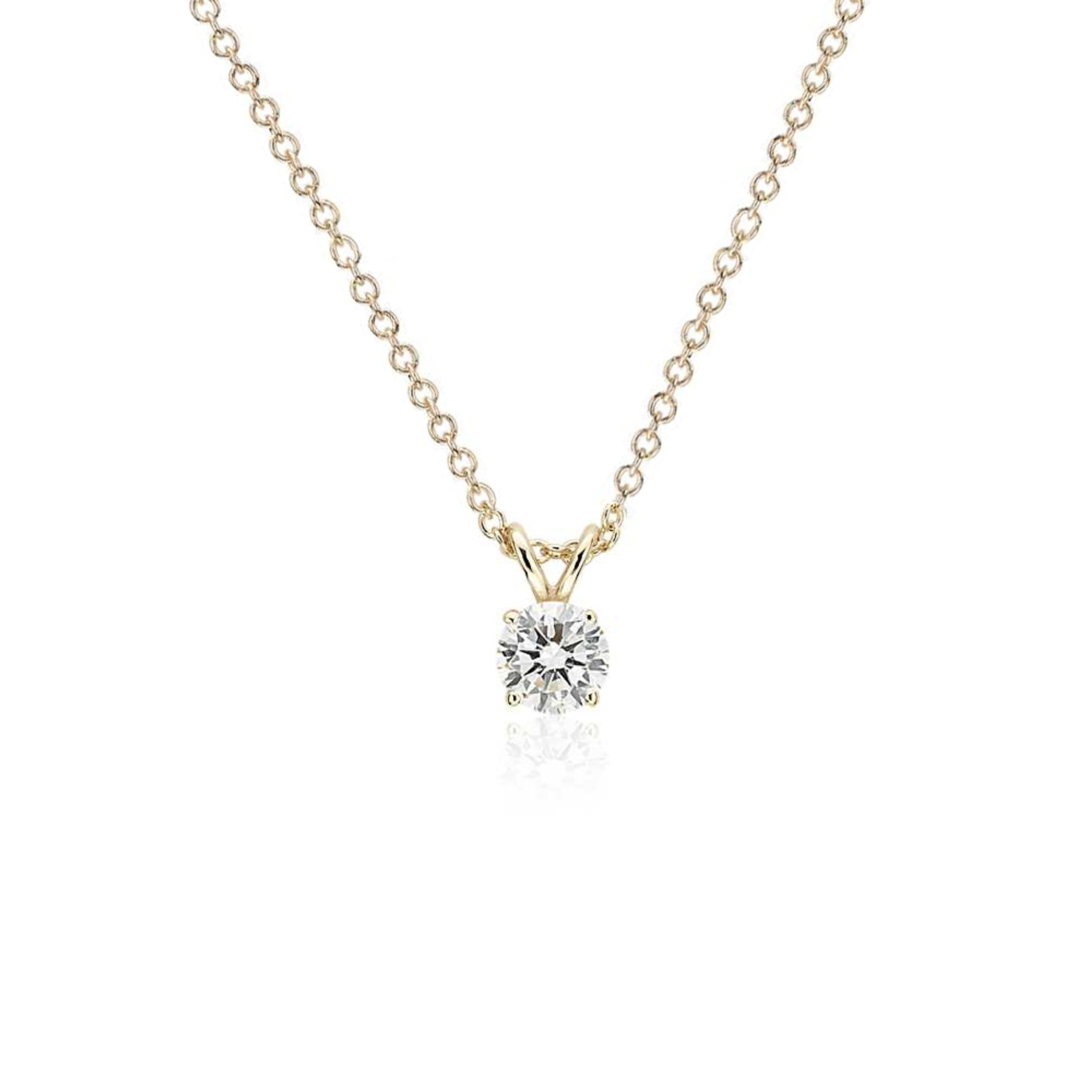 A 3/4 Carat Round Diamond Four Prongs Pendant A 3/4 Carat Round Diamond Four Prongs Pendant
