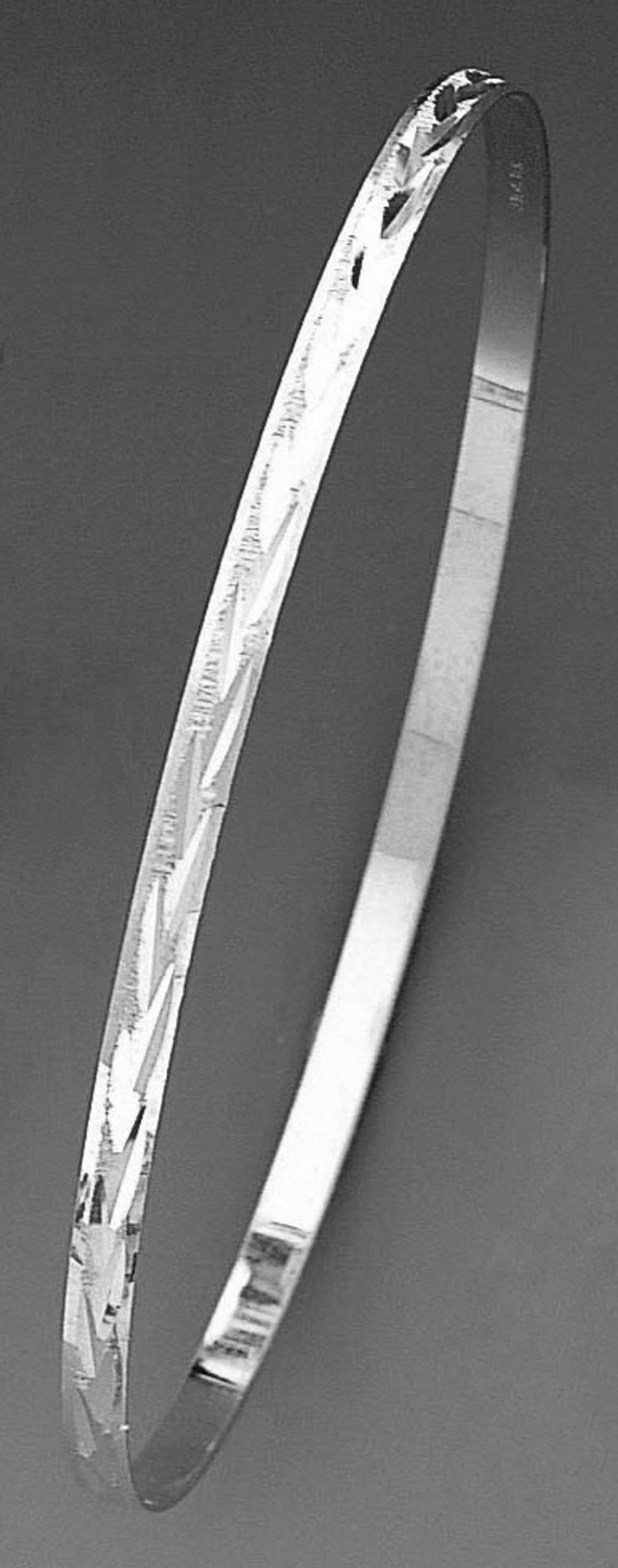 14k WhiteGold 3.5mm Wide Engraved Slip-on Solid Leaf Pattern Bangle 7 Inches 14k WhiteGold 3.5mm Wide Engraved Slip-on Solid Leaf Pattern Bangle 7 Inches