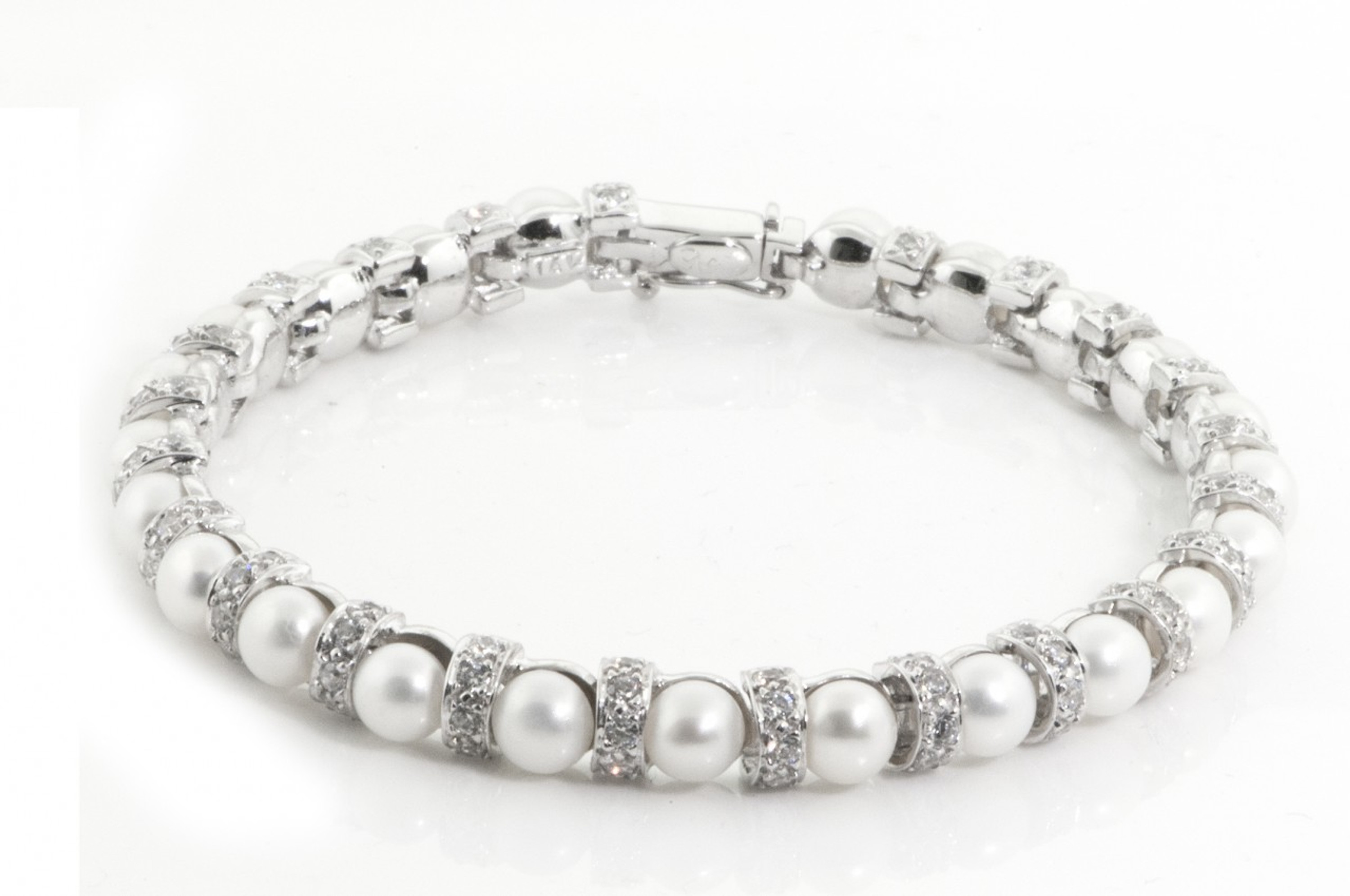 14k White Gold 2.6mm wide Genuine Pearl and Cubic Zirconia Bracelet 7 Inches 14k White Gold 2.6mm wide Genuine Pearl and Cubic Zirconia Bracelet 7 Inches