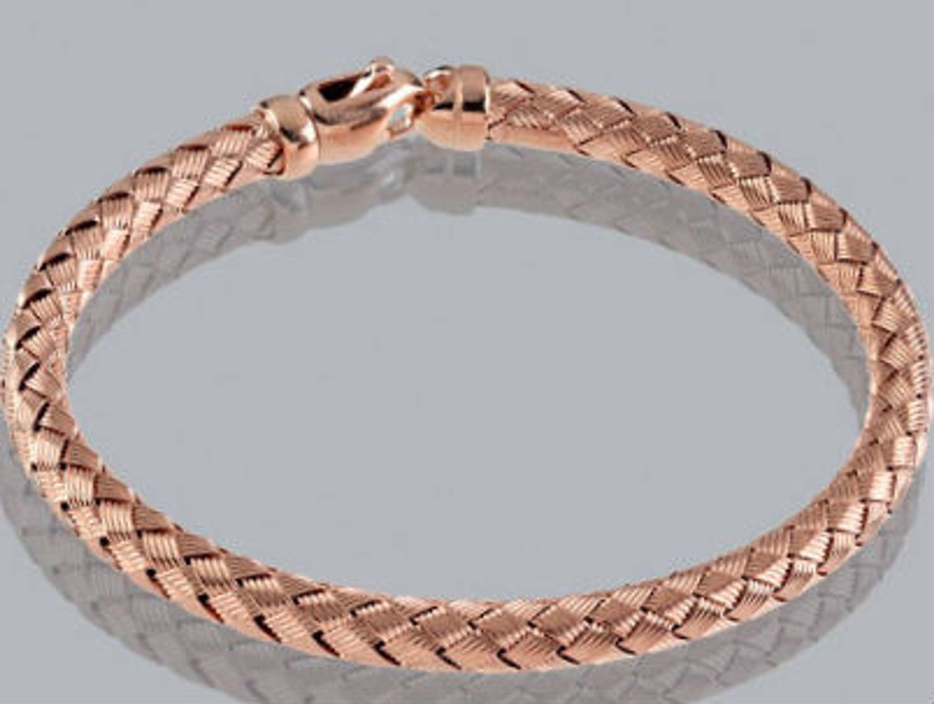 14k Rose Gold 5mm Wide Basket Weave Braided Bangle 7" 14k Rose Gold 5mm Wide Basket Weave Braided Bangle 7"