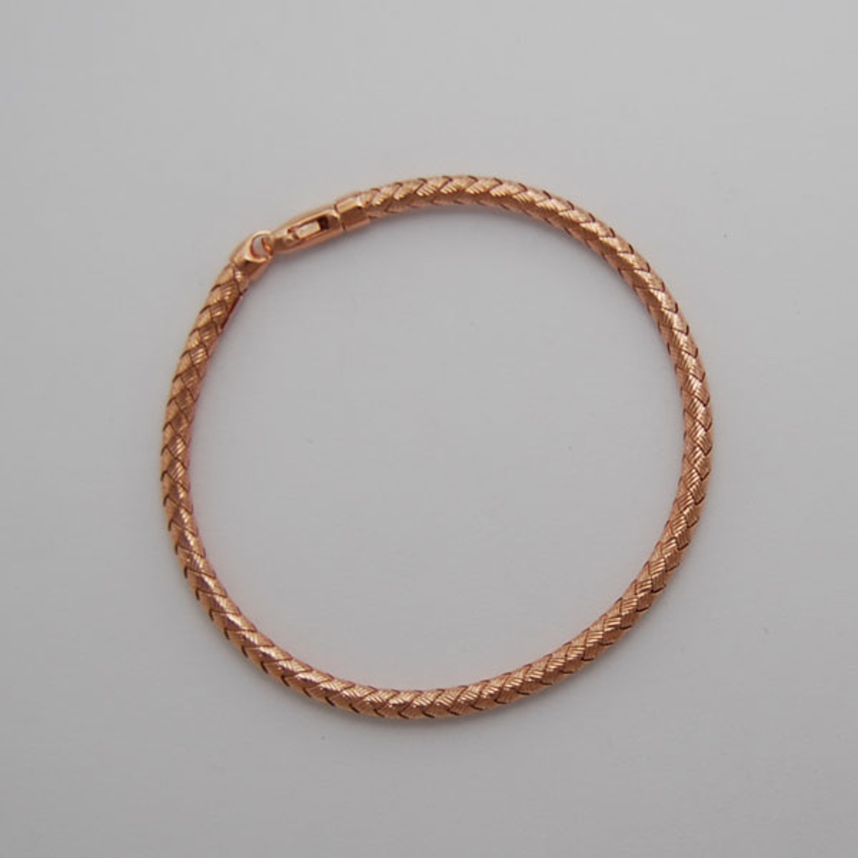 14k Rose Gold 3.5mm Wide Basket Weave Braided Bangle 7" 14k Rose Gold 3.5mm Wide Basket Weave Braided Bangle 7"