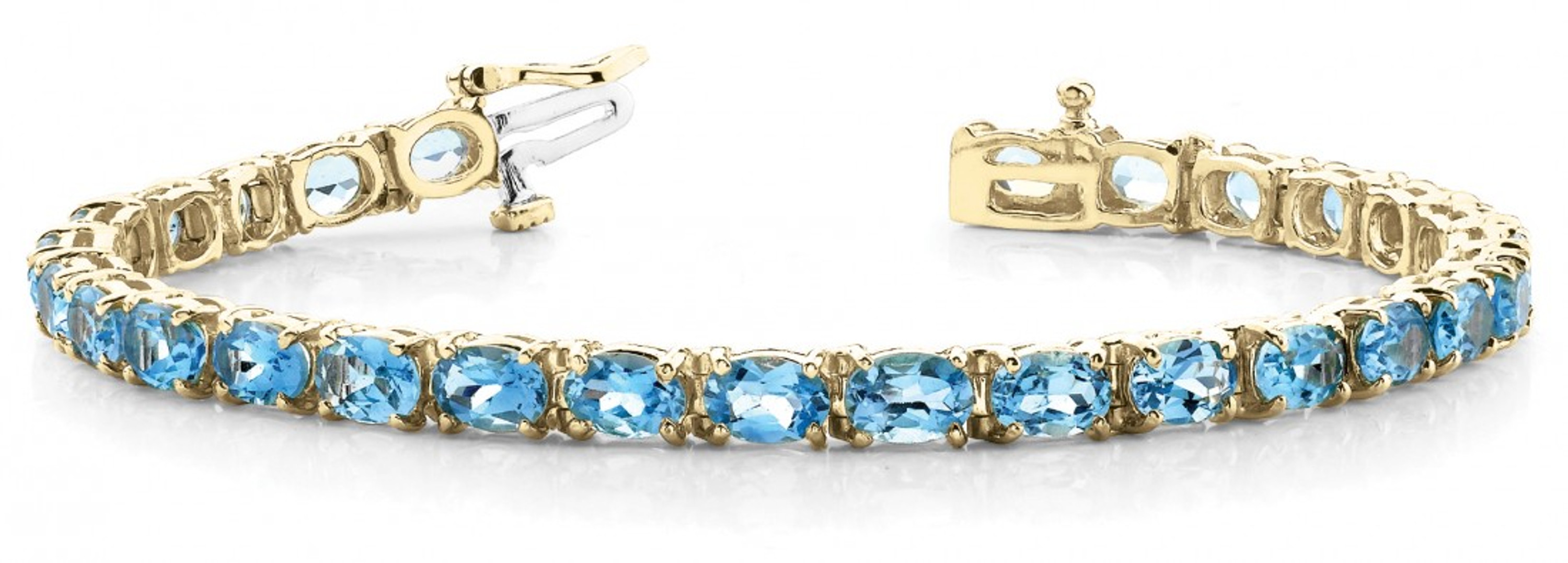 14k Yellow Gold Genuine Blue Topaz Bracelet 5mm x 7mm 14k Yellow Gold Genuine Blue Topaz Bracelet 5mm x 7mm