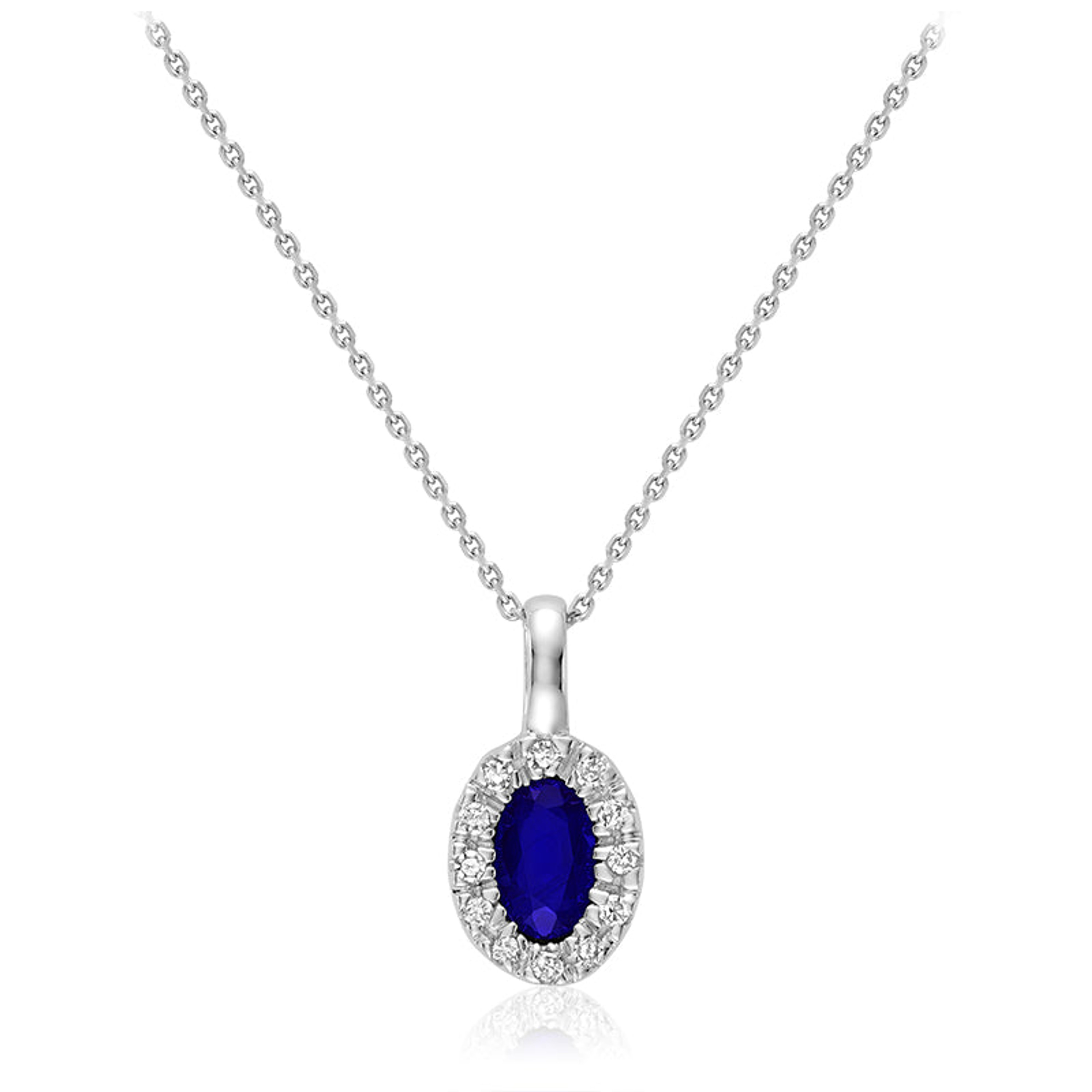 10k White Gold Oval Shaped Blue Sapphire Surrounded By Round Diamond Pendant 10k White Gold Oval Shaped Blue Sapphire Surrounded By Round Diamond Pendant