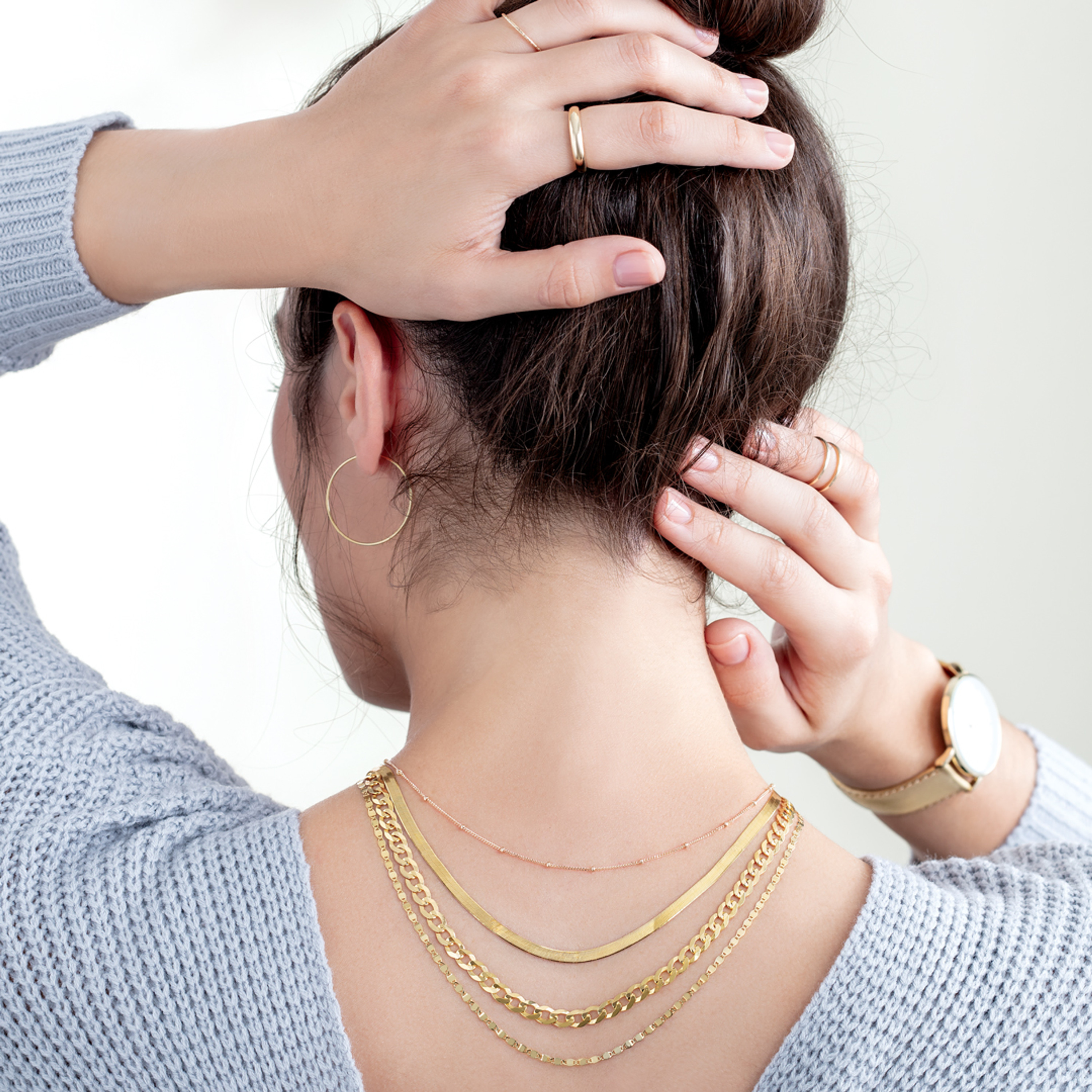 Gold layering necklace trend