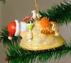 Cape Shore Santa Buried in sand with Crab on Top Christmas Ornament Resin