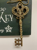 Santas Magic Key Holiday Green Wall Plaque with Ornate Golden Key 15.75 Inches