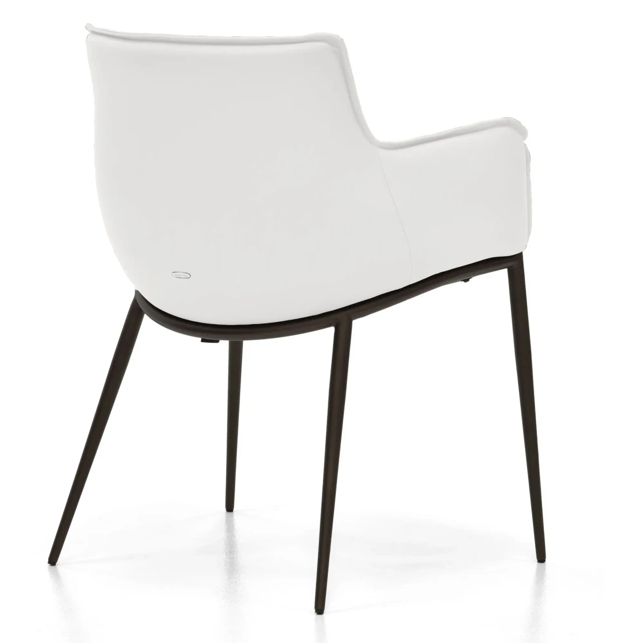 BIANCO || BRONZE EMBOSSED STEEL - Rear view of a modern white leather dining chair with slim dark brown metal legs.