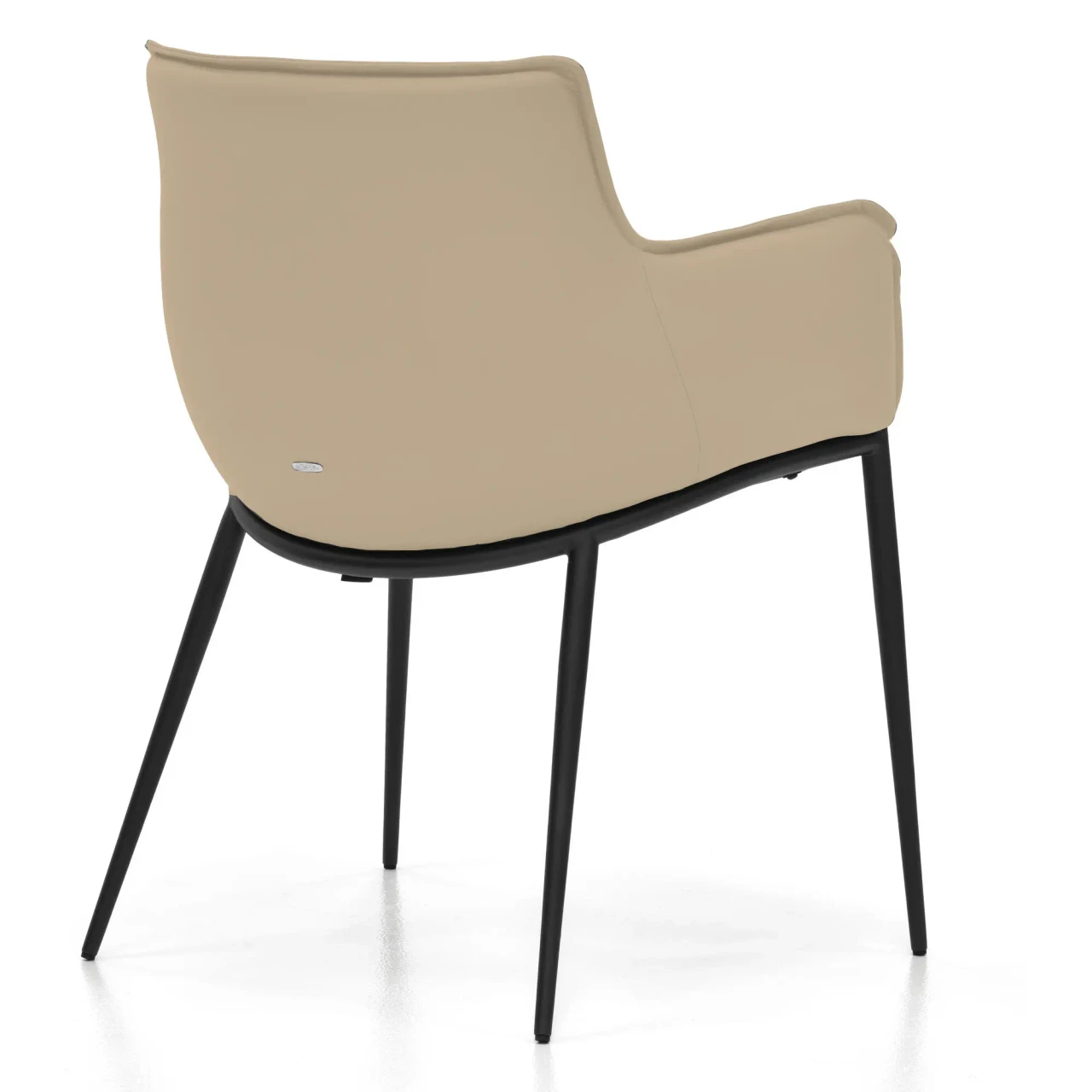 CASHMERE || GRAPHITE EMBOSSED STEEL - Rear view of a modern beige leather armchair with slim black metal legs.
