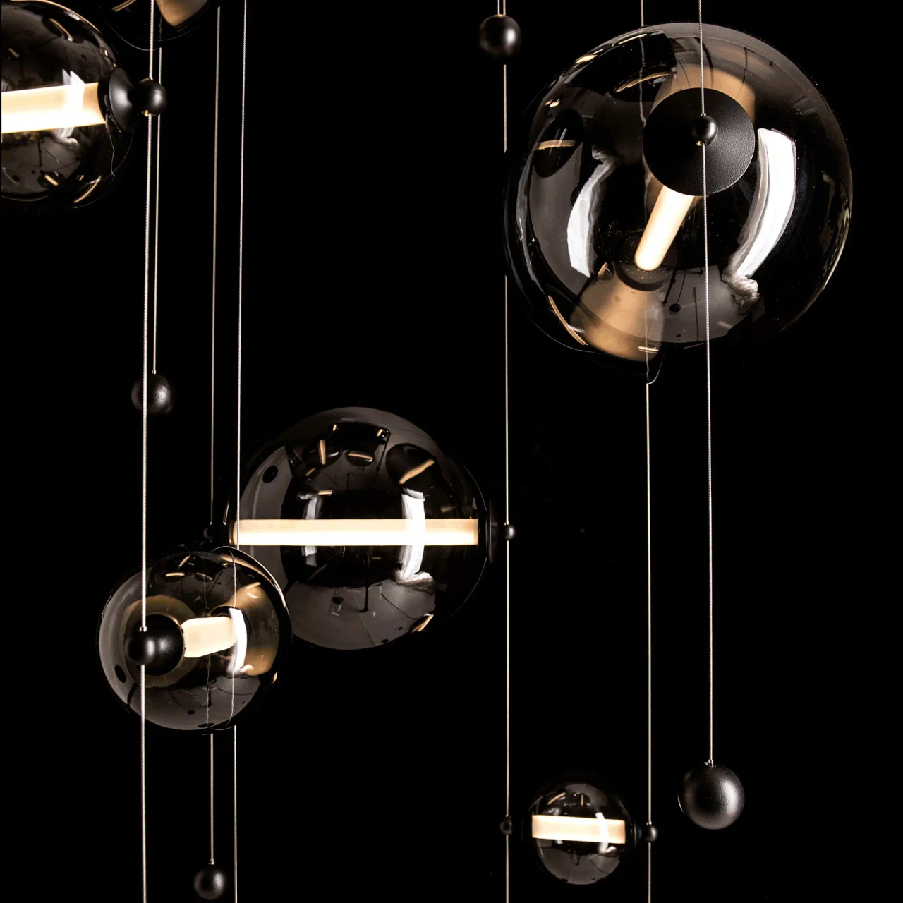 Abacus 10-light Chandelier, modern style, black finish, cool grey glass, LED lights, close-up detail angle.