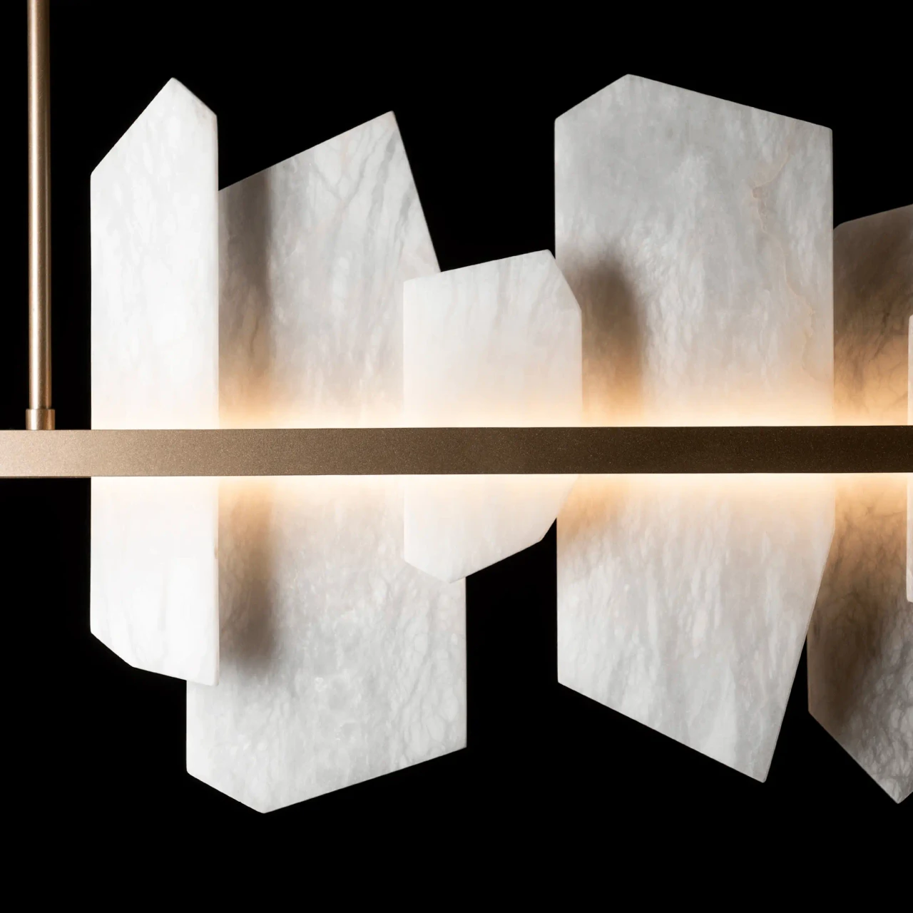 SOFT GOLD || Closeup - Volterra Linear Led Pendant in Soft Gold Finish and Alabaster Stone, close-up view of integrated LED lighting.