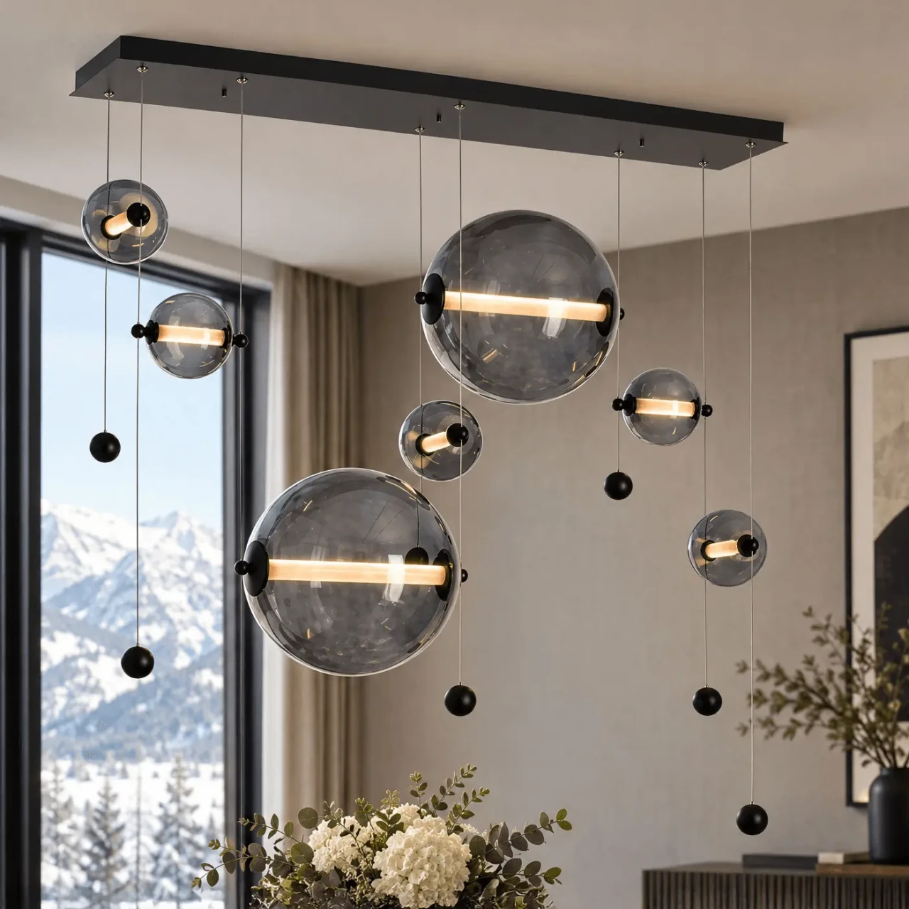 Abacus 7-light chandelier, modern black finish, cool grey glass globes, LED, living room setting, front eye-level view.