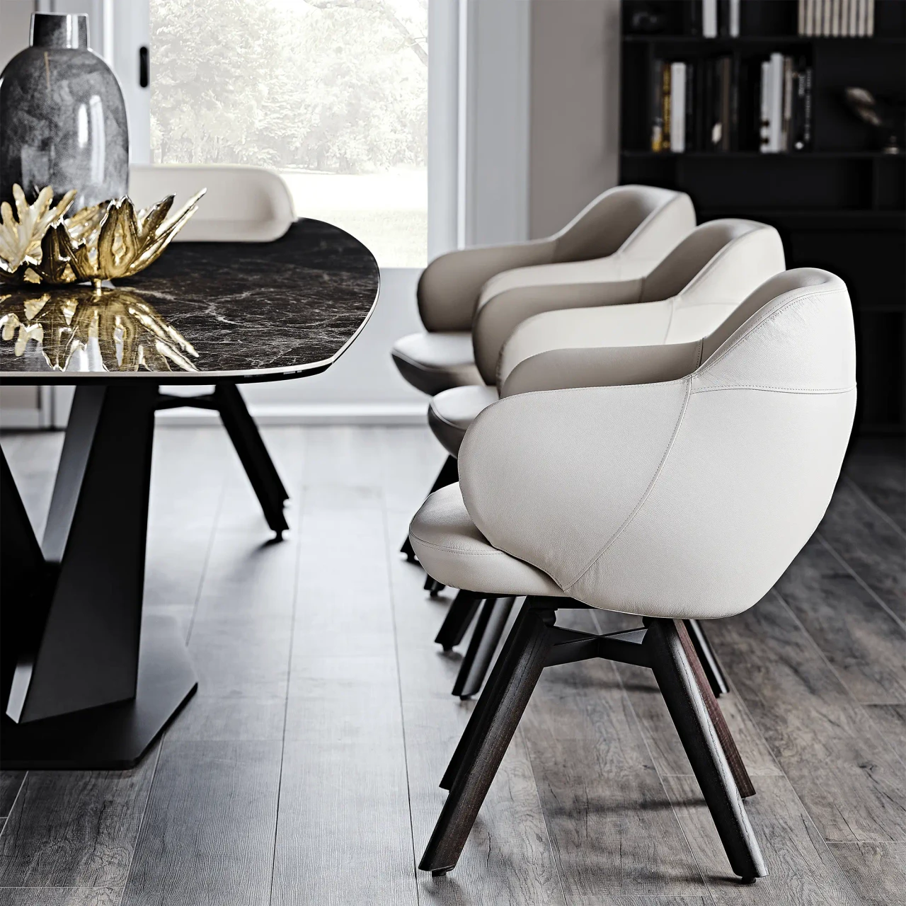 Cattelan Bombe Swivel Chair in Lino Soft Leather with Burned Oak Legs, modern dining room setting, side angle view.