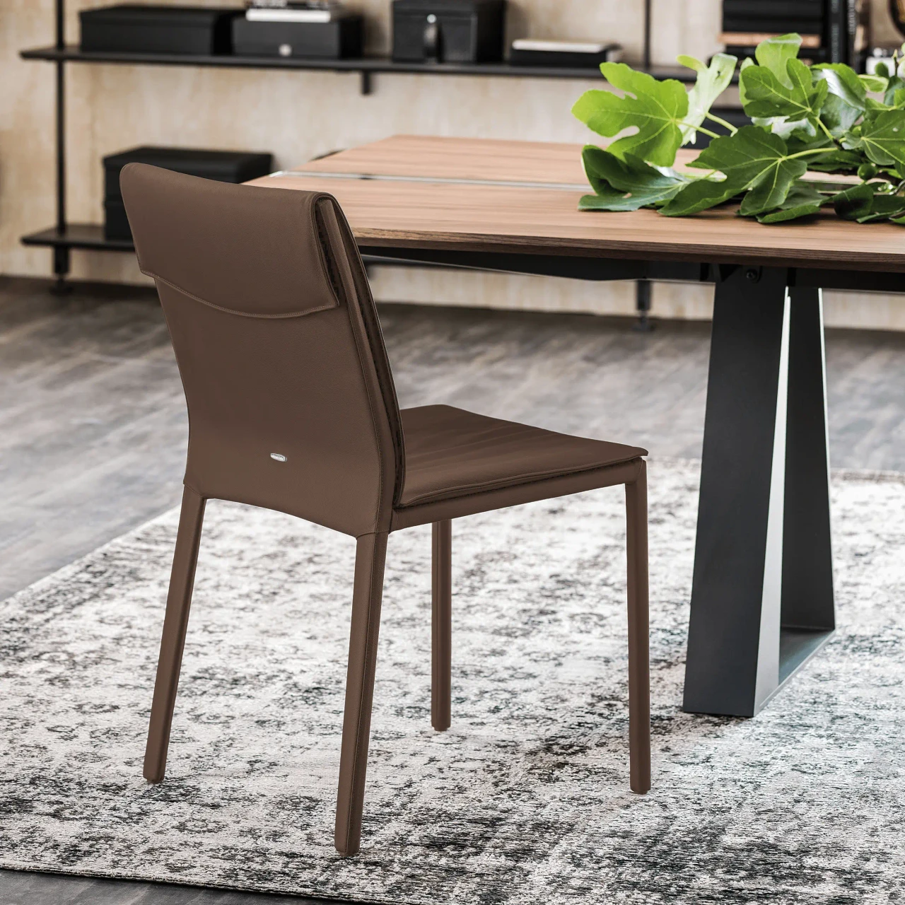 TABACCO - Cattelan Isabel H Side Chair in Tabacco Soft Leather, modern style, side view in a dining room setting.