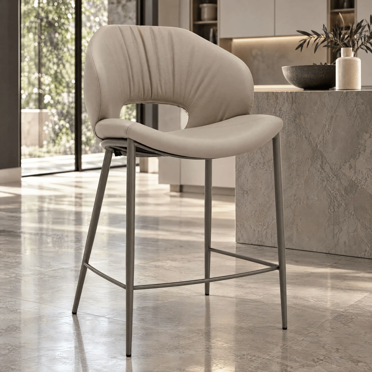 Cattelan Miranda Counter Stool in Cashmere Soft Leather with Titanium Embossed Legs, 3/4 view in a modern kitchen setting.