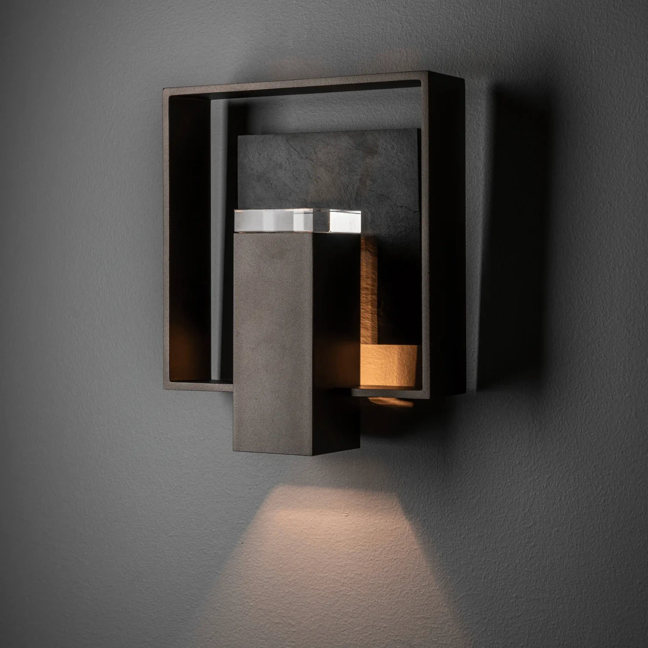Shadow Box Slate Sconce in Oil Rubbed Bronze with clear glass and slate accent, modern wall light, front view.