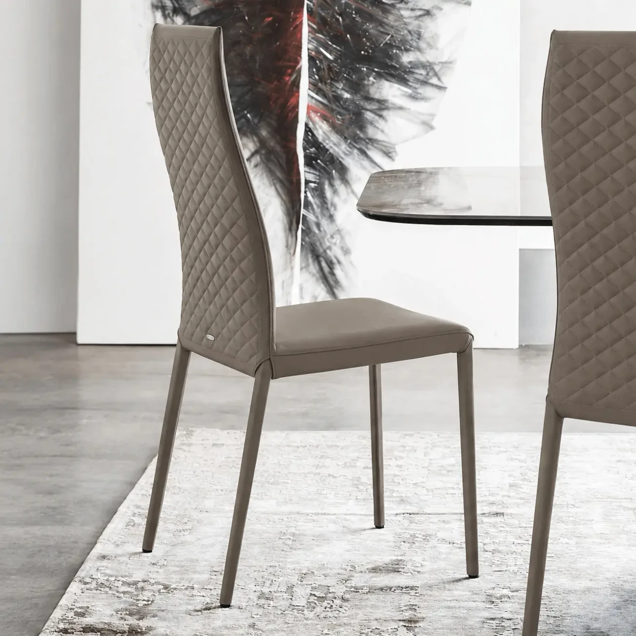 CASTORO - Cattelan Norma Couture High Back Side Chair in Castoro Soft Leather 951, diamond tufted back, side view in dining room.