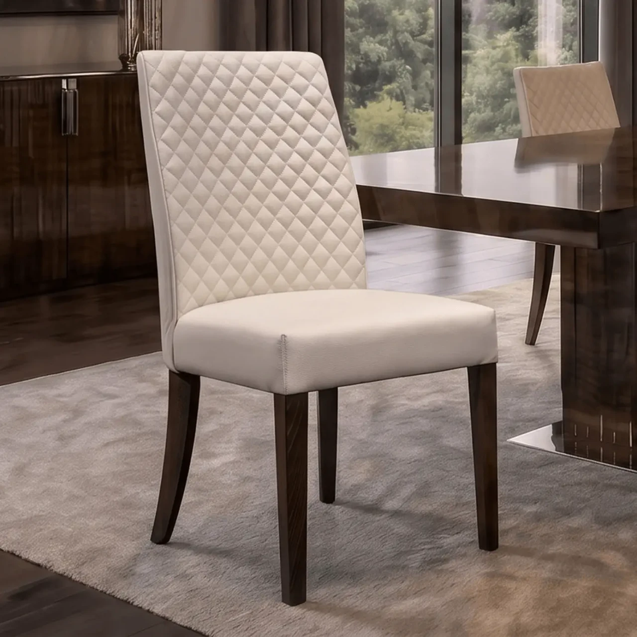 Malerba Red Carpet Side Chair, diamond tufted back, ecru leather, dark wood legs, 3/4 view in dining room setting.