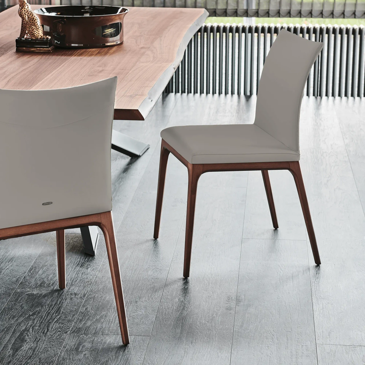 DAKOTA - Cattelan Arcadia Side Chair in Dakota Soft Leather and Walnut Stained Beech Frame, modern dining room, side view.
