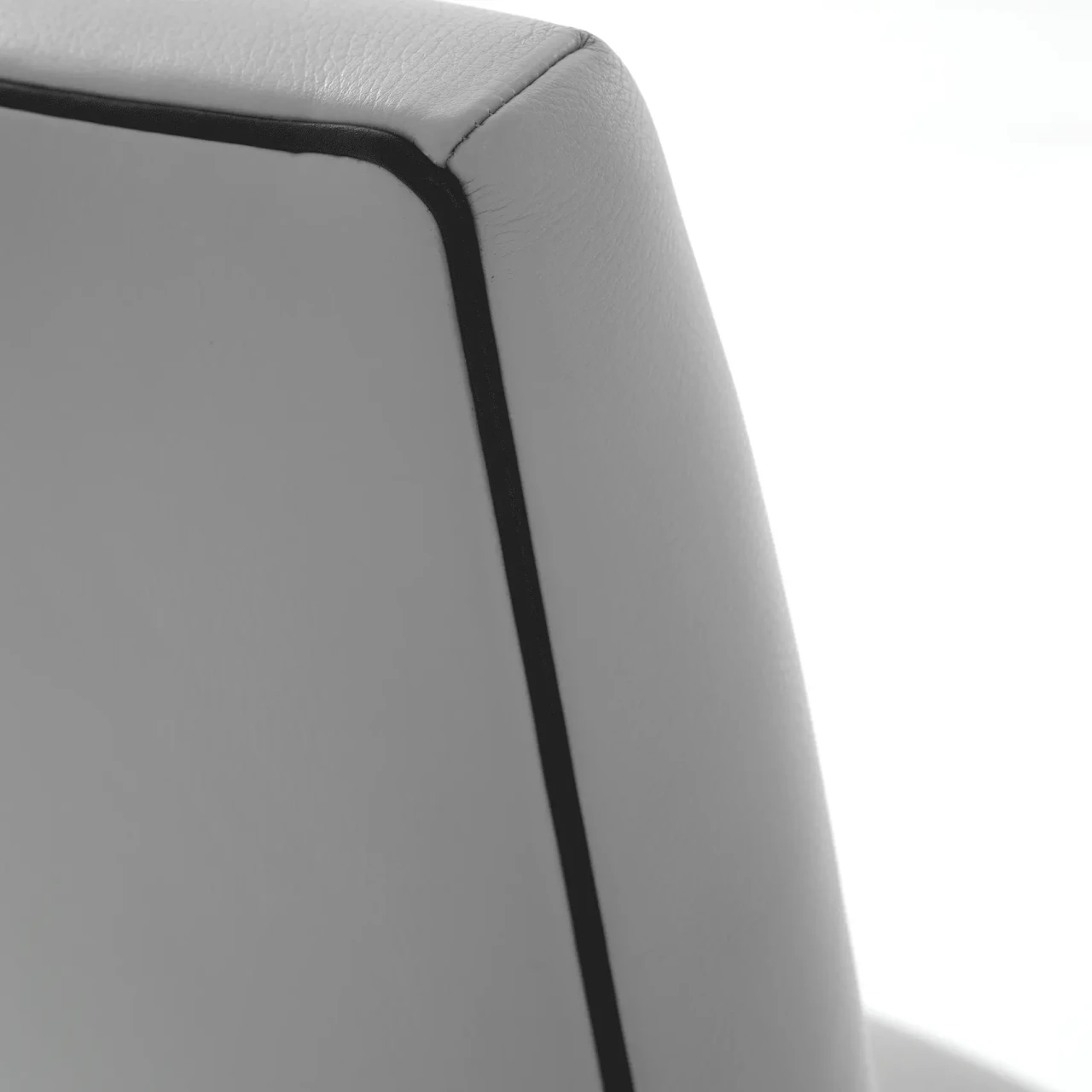 LIGHT GREY LEATHER || Closeup - Close-up angle of Malerba Black & More Side Chair in Grey Leather C51 with black welt detailing.