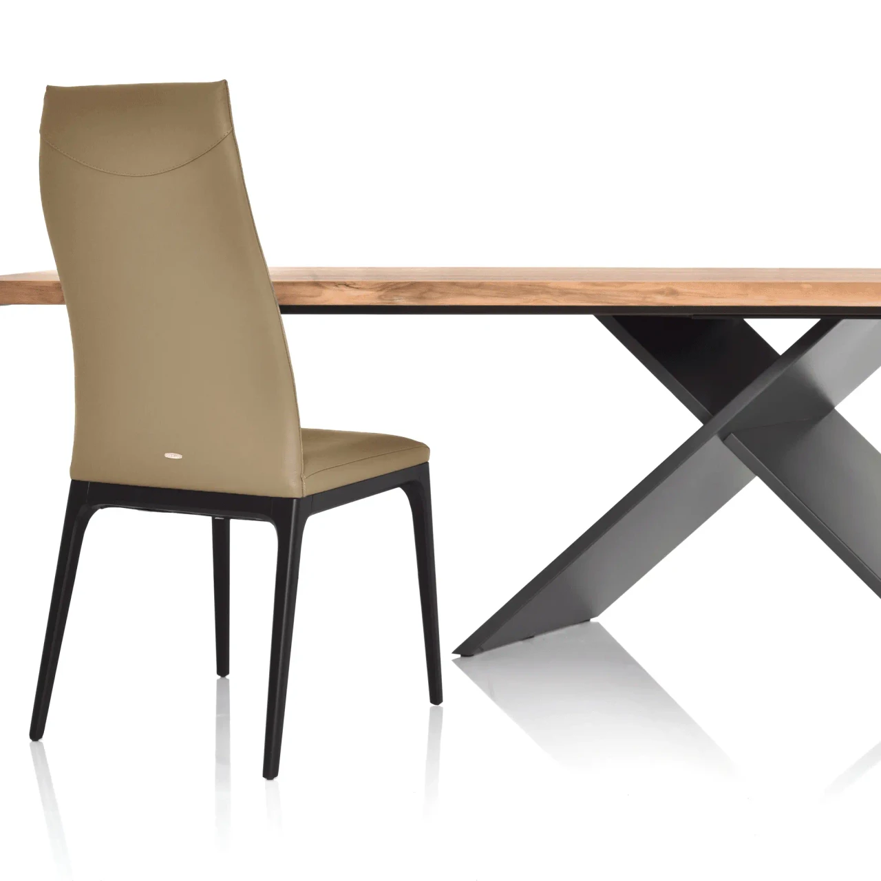 TORTORA || MATTE BLACK - Cattelan Arcadia High Back Chair in Tortora soft leather with matt black stained beech frame, side view in dining setting.