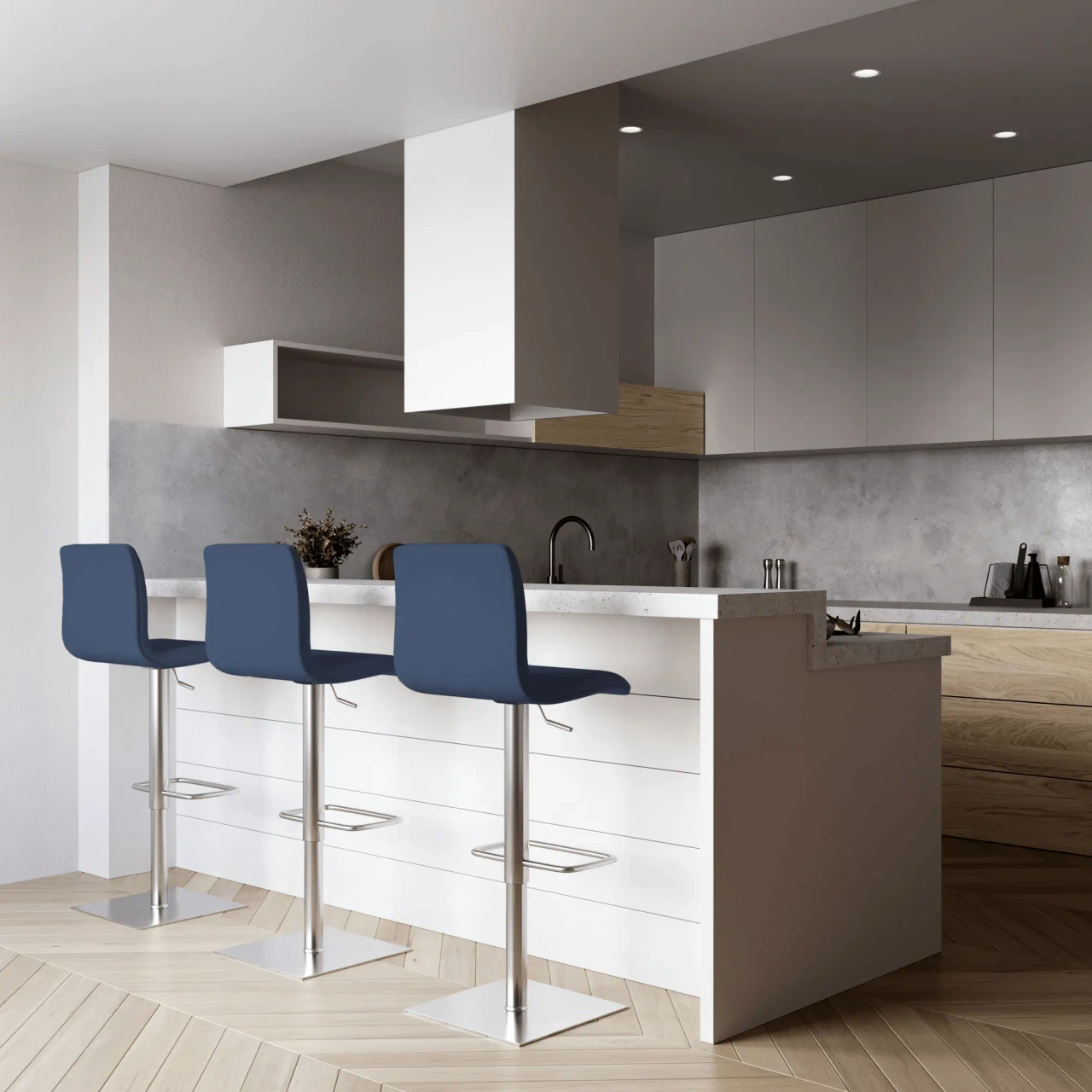 COBALT BLUE LEATHER - Three blue modern bar stools with faux leather seats and chrome bases in a kitchen, front view.