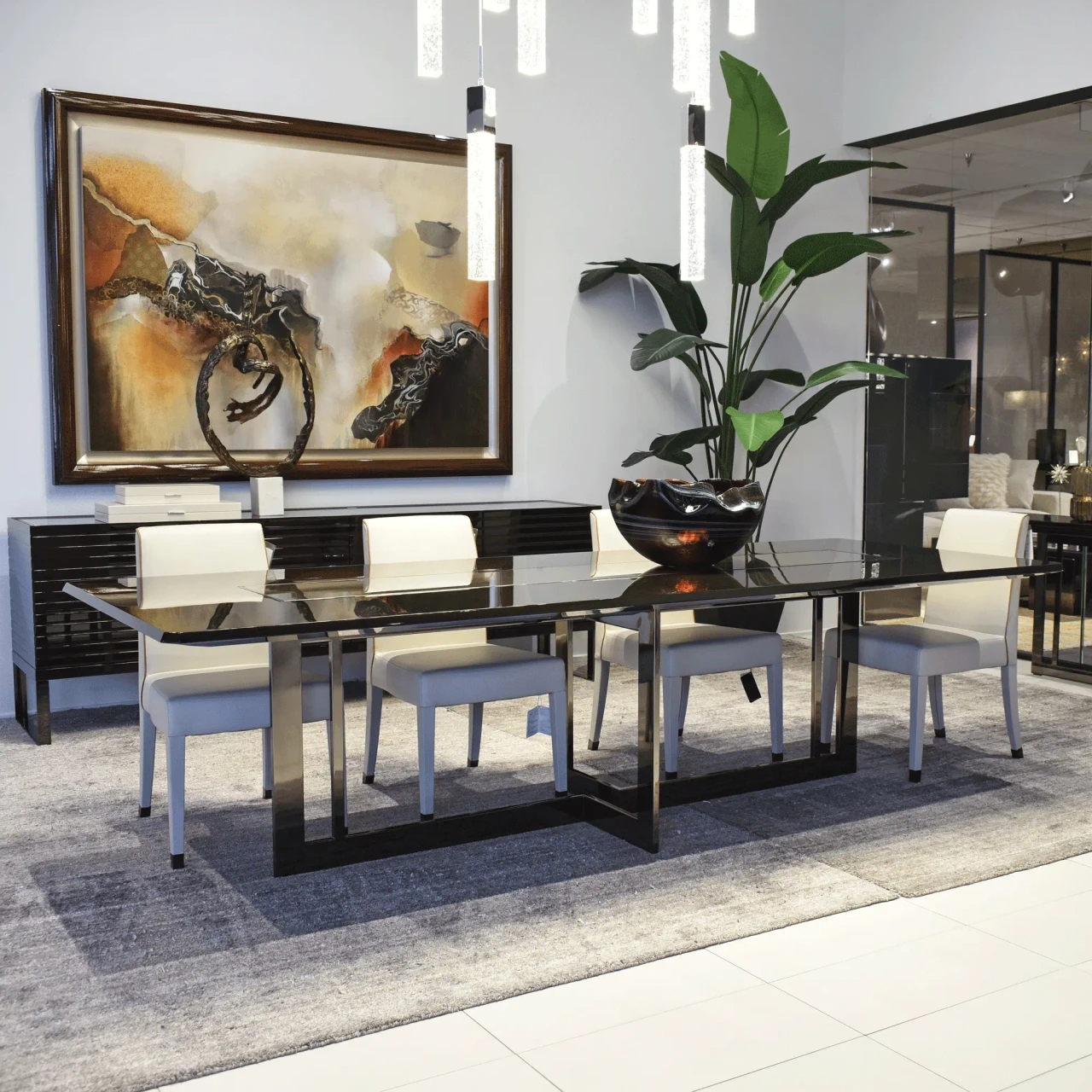 Malerba Perfect Time Side Chair in beige leather with black chrome leg caps in a modern dining room, front angle view.