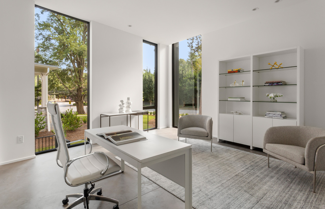 WHITE ECOPELLE - White Orion Executive Chair Shown in an Office Setting