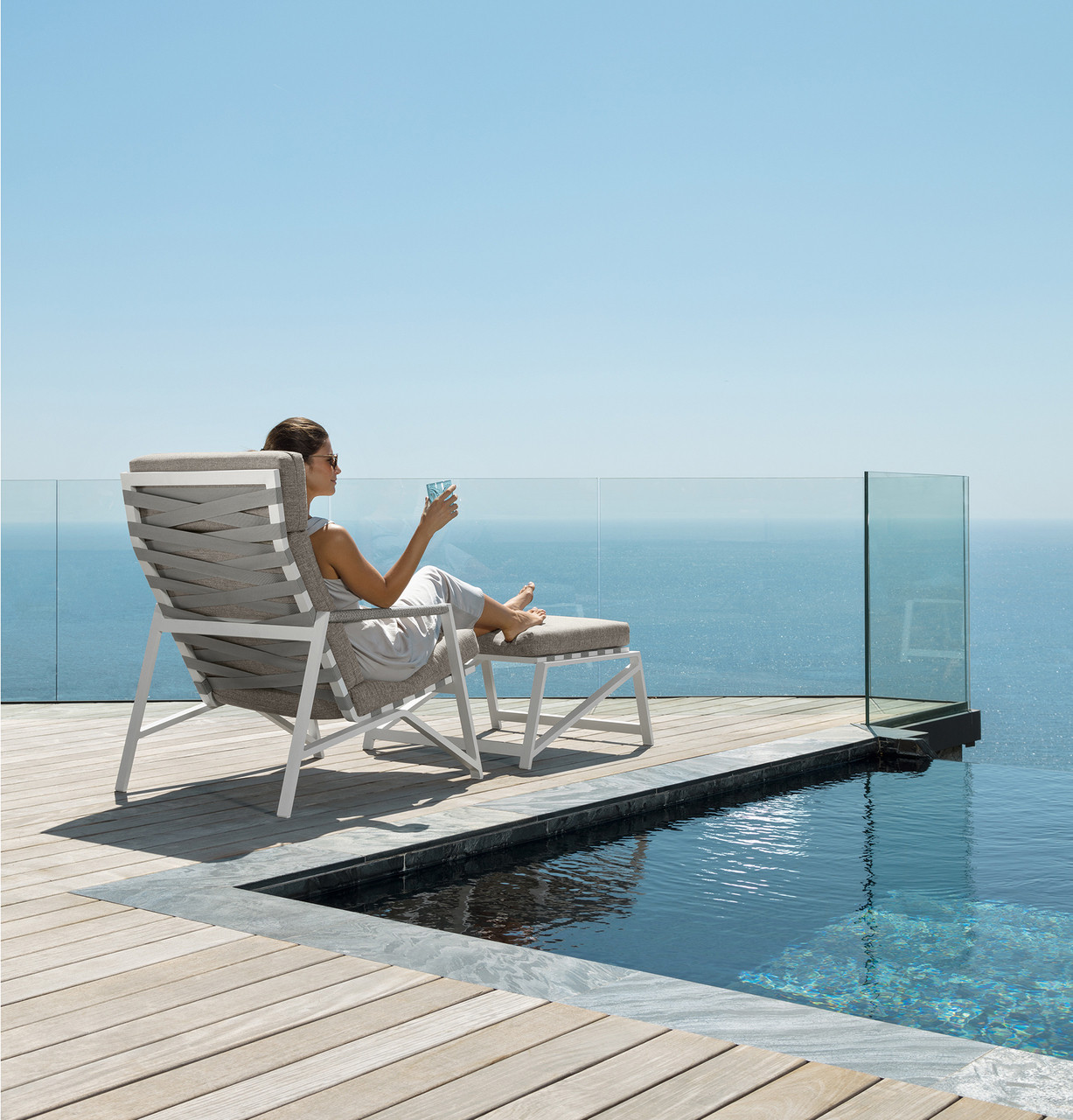 Closeup - Cottage Ottoman Shown in an Outdoor Setting