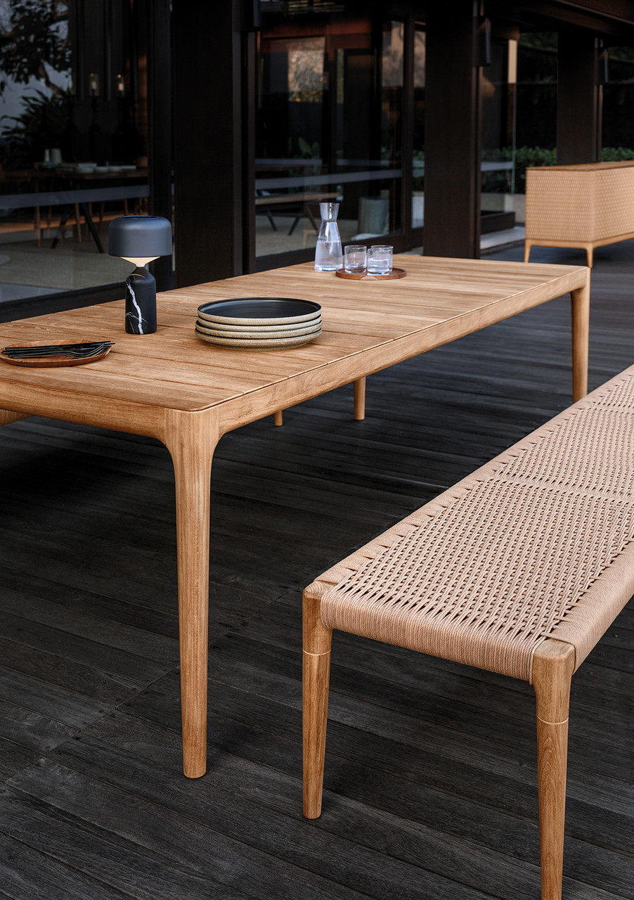Image courtesy of Gloster Furniture, Inc | Lime Dining Bench Shown in an Outdoor Setting