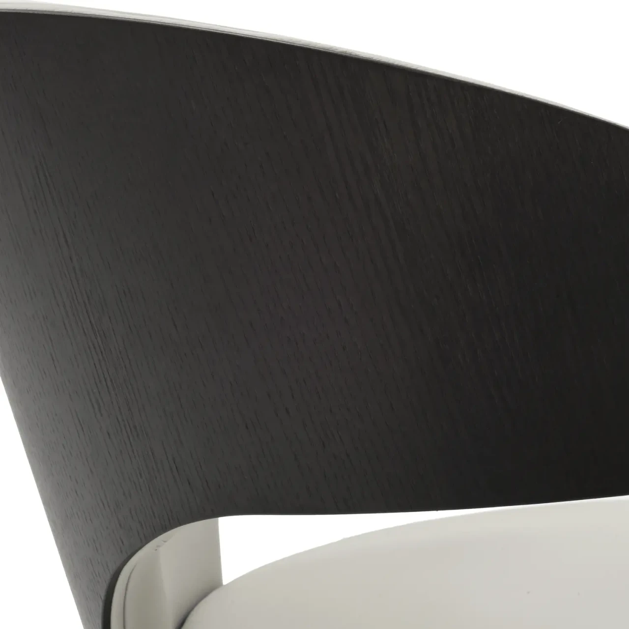 Closeup - Close-up angle of Wing Side Chair with Burnt Ash wood outside back and beige leather seat.