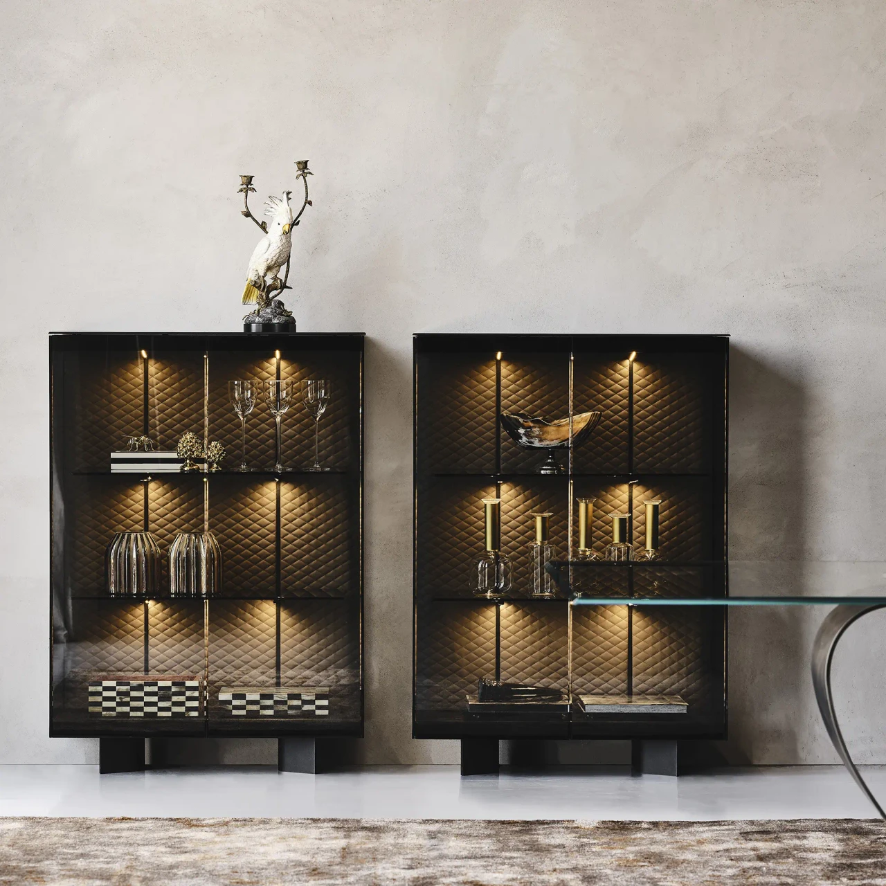 Cattelan Boutique Alta Display Case, black embossed steel base, fume glass, living room setting, front view.