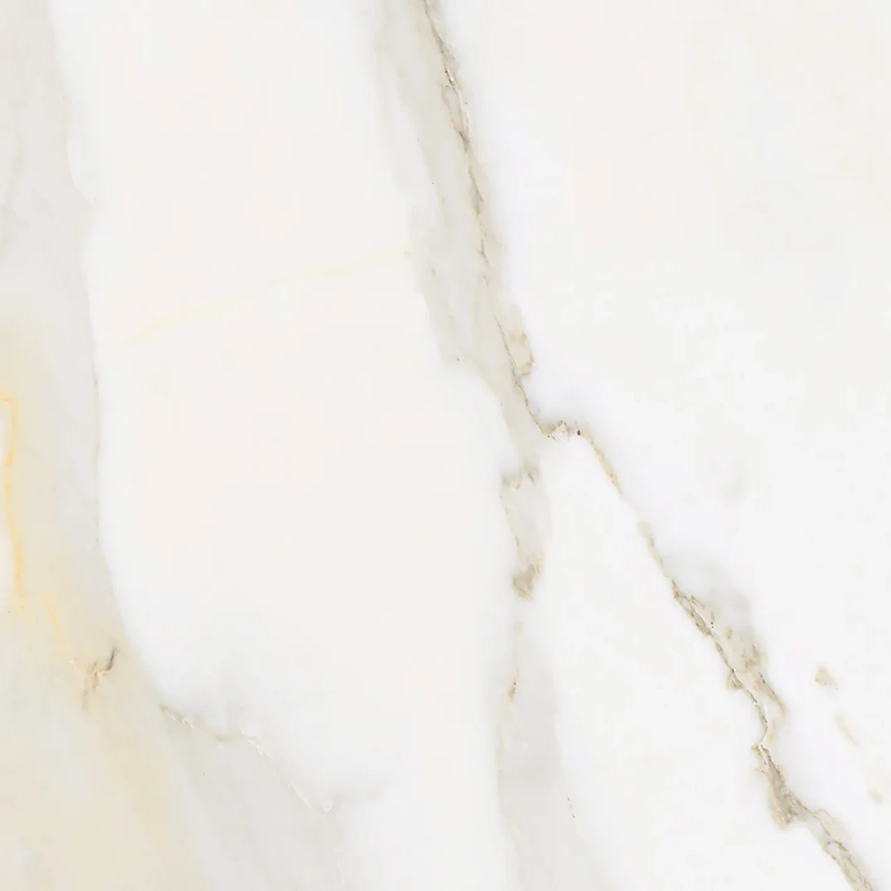 MATTE GOLDEN CALACATTA || GRAPHITE EMBOSSED STEEL || Closeup - Cattelan Skorpio Keramik Dining Table, Matt Golden Calacatta Ceramic top, close-up overhead view of marble-style texture.