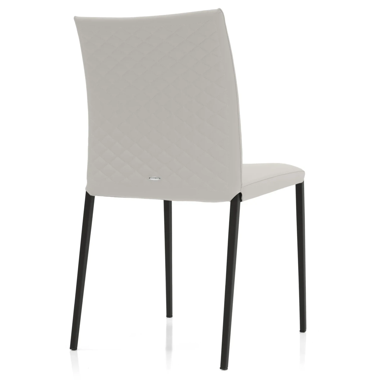 CANOVA - Rear view of a modern light grey faux leather dining chair with diamond quilted stitching and black metal legs.