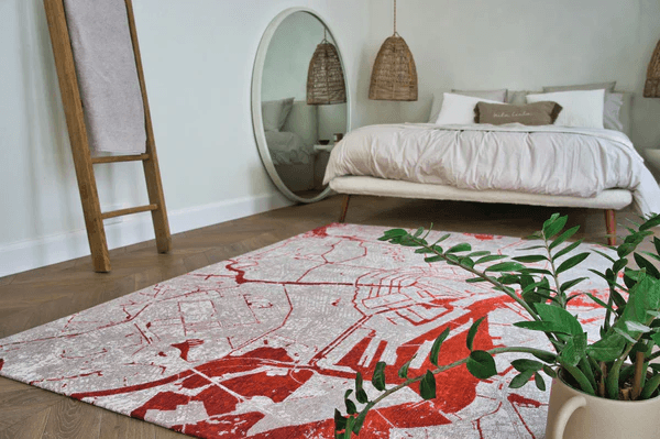 Cities Area Rug Shown in a Bedroom Setting