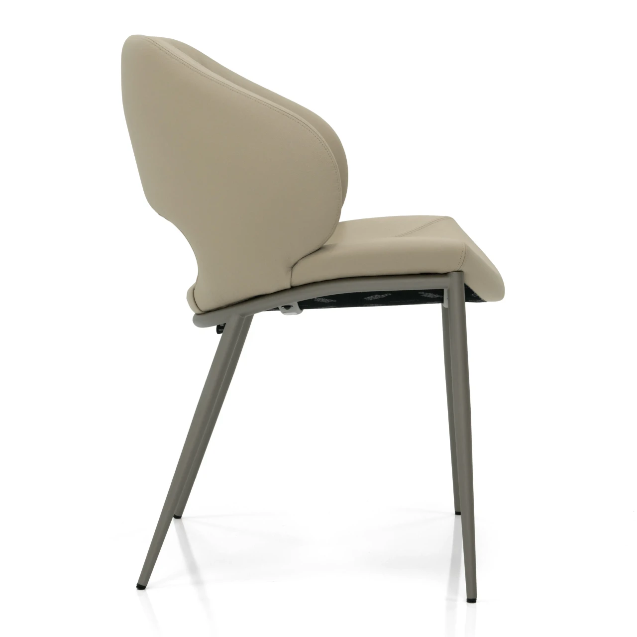 CASHMERE - Side view of a modern beige faux leather dining chair with slim grey metal legs.