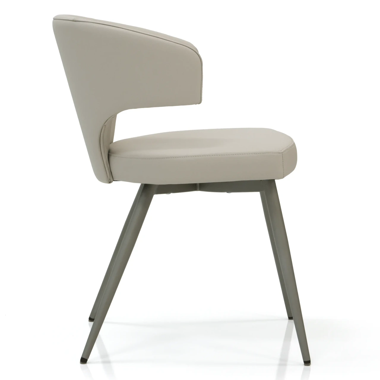 BEIGE - Modern dining chair in light grey faux leather with tapered legs, side profile view.