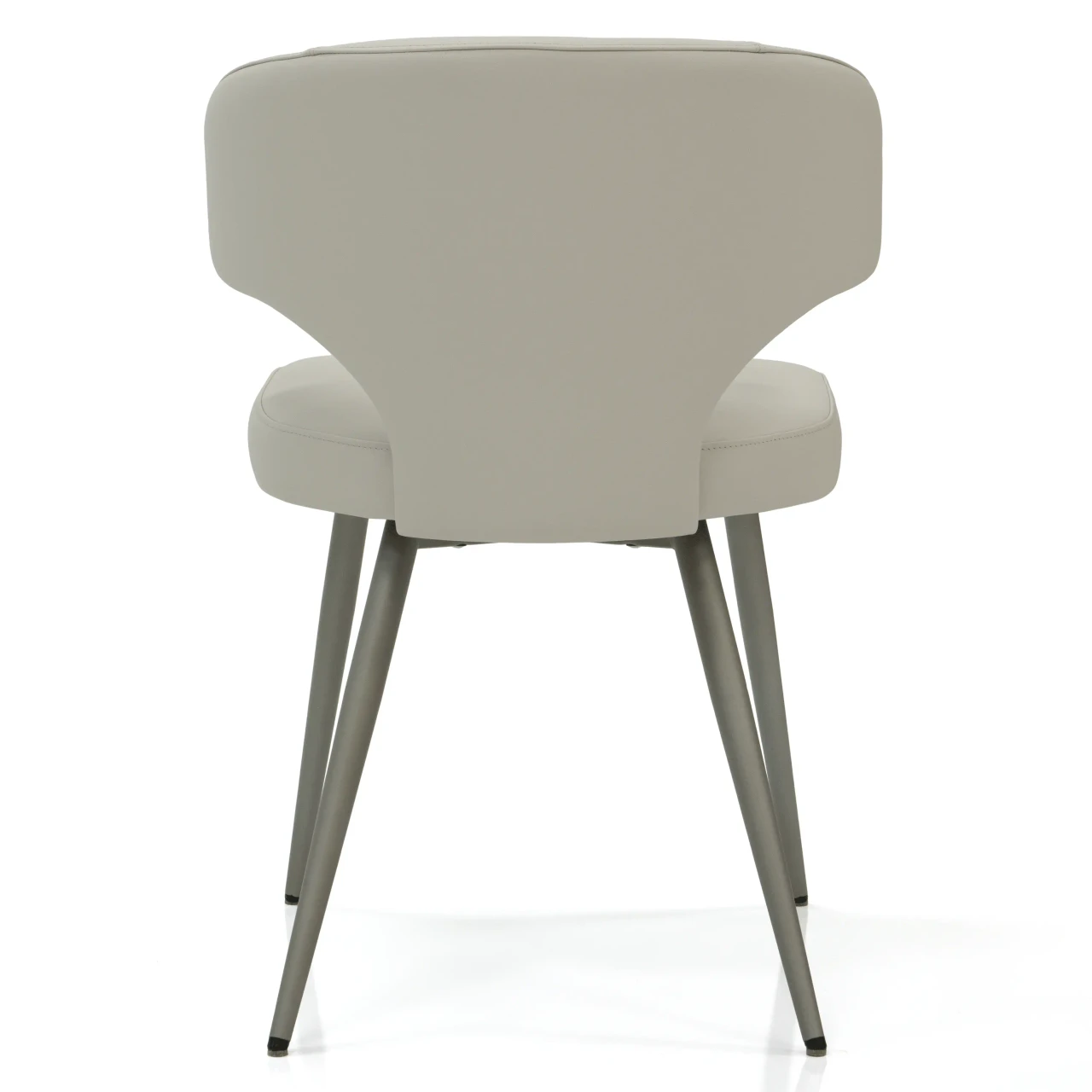 BEIGE - Rear view of a modern grey faux leather dining chair with tapered metal legs.