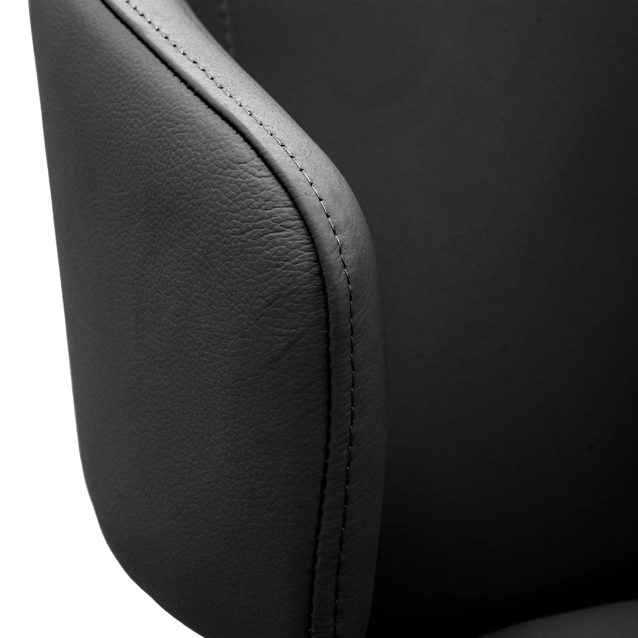 BLACK || Closeup - Close-up side view of a black leather office chair featuring detailed contrast stitching on the armrest.