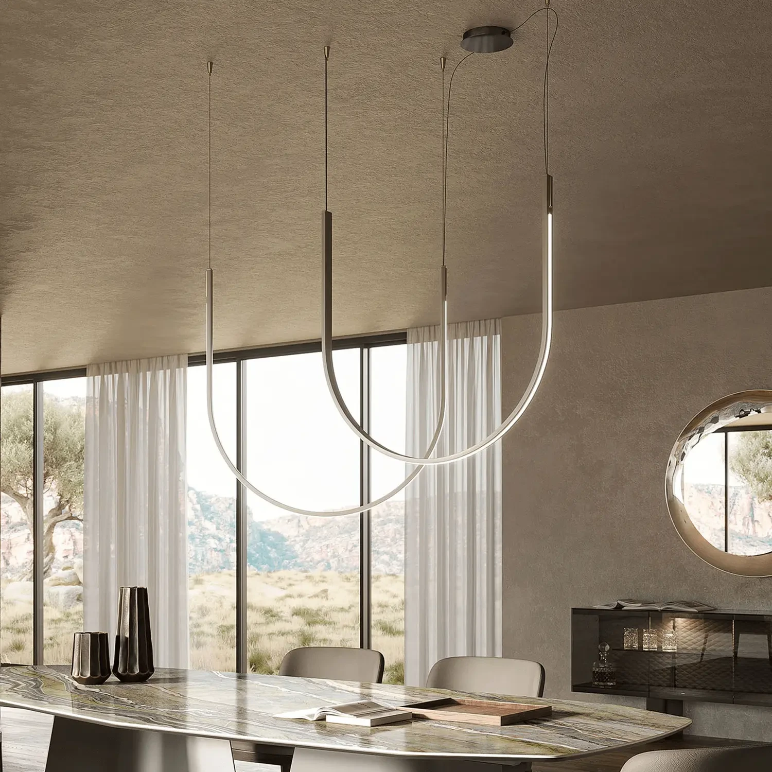 L1/L1 - Cattelan Nahun 2-light Ceiling Lamp, modern curved LED, Satin Iron Grey w/ Brass, dining room setting, eye-level view.