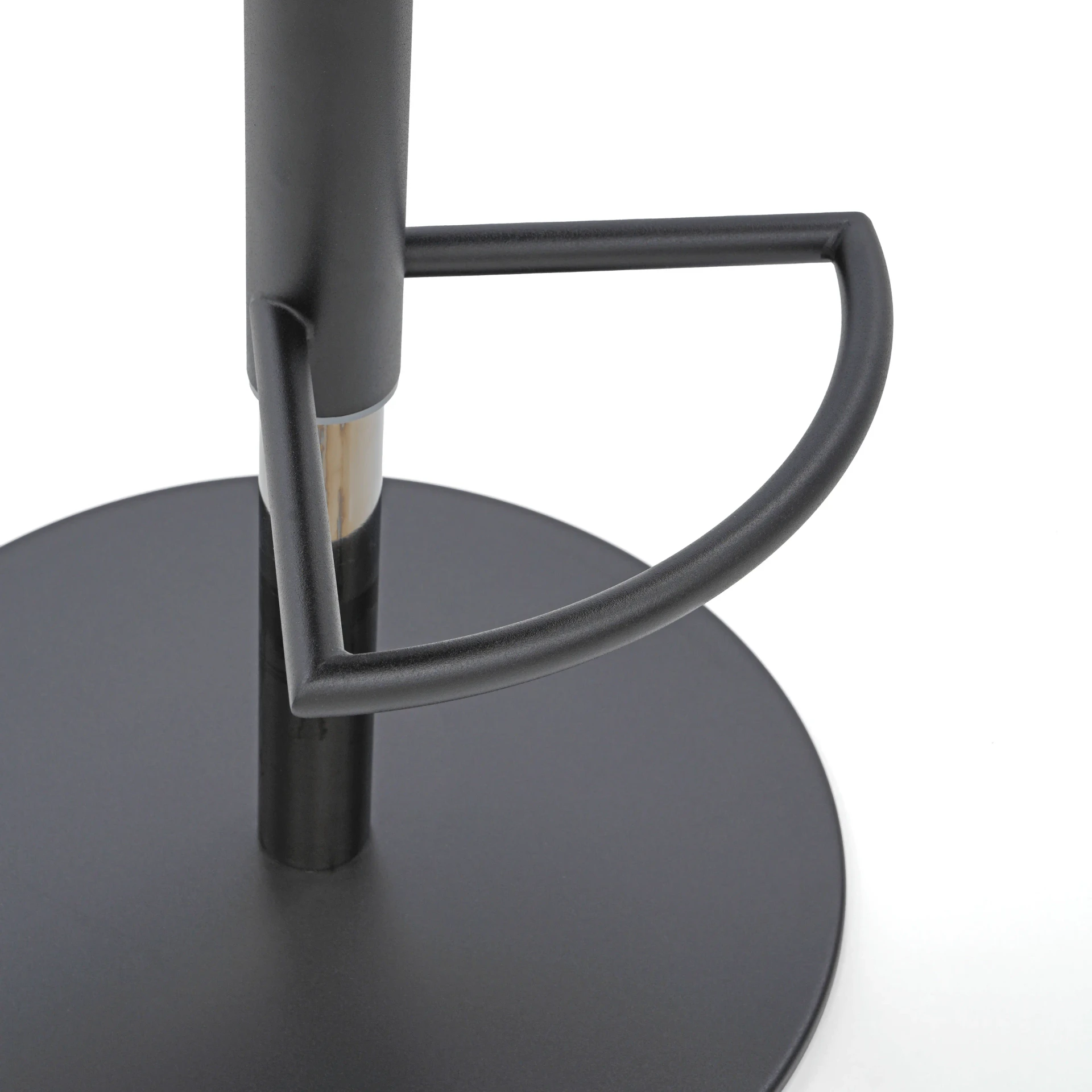 Closeup - Close-up of Tess Bar Stool black metal base, post, and footrest with black chrome gas lift.