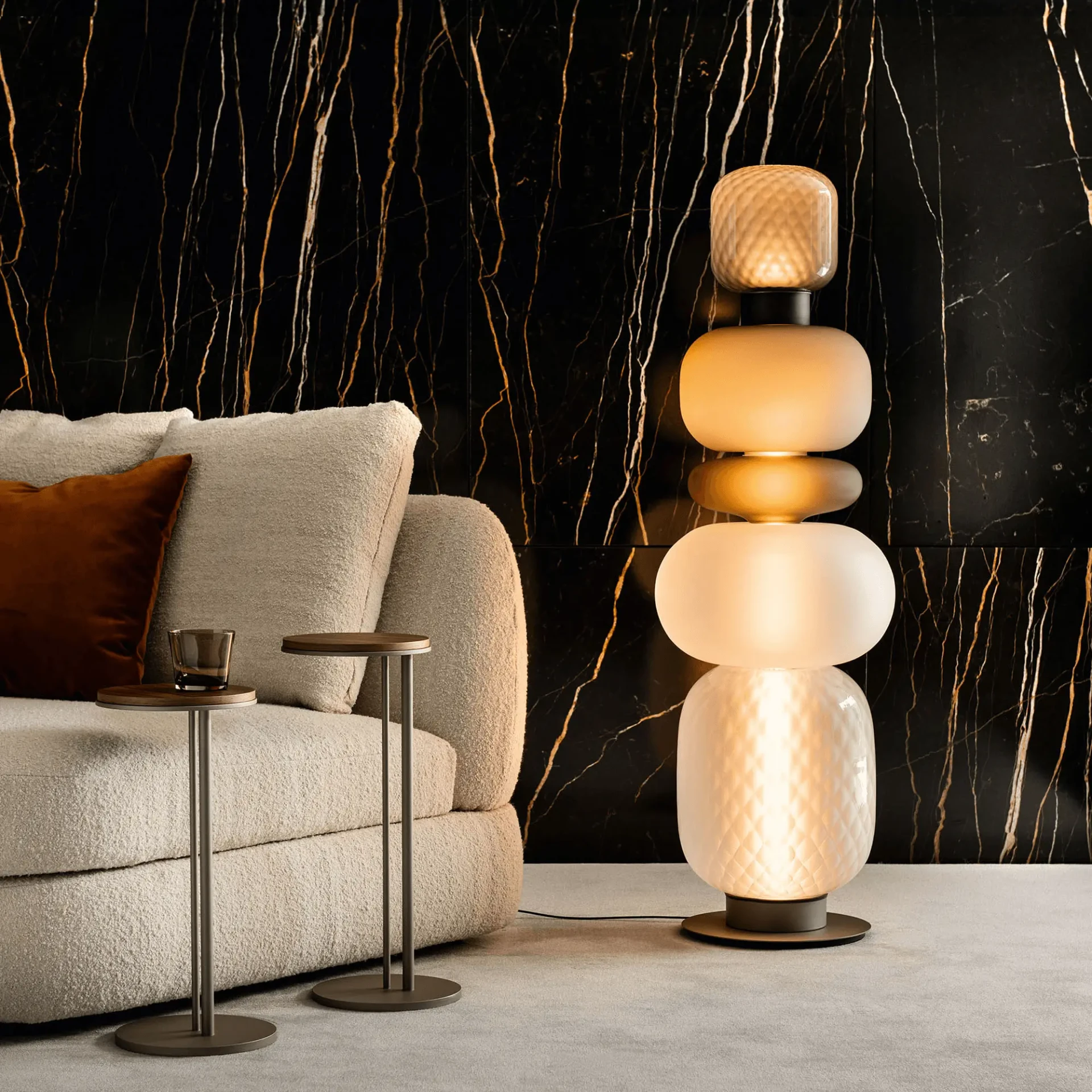 Cattelan Pigalle Floor Lamp in living room, blown glass and titanium embossed steel base, side view, modern style.