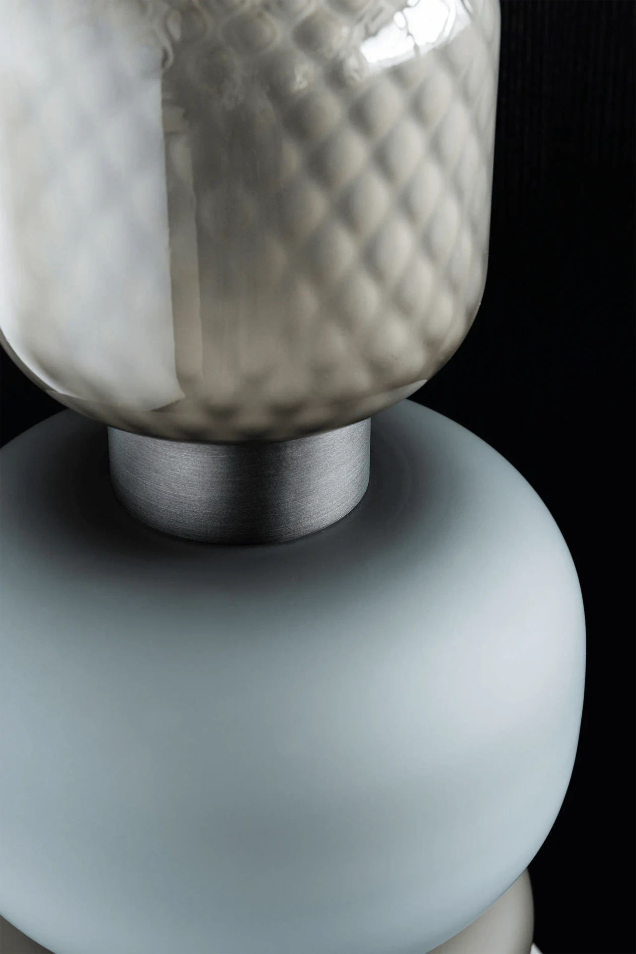 Closeup - Cattelan Pigalle Floor Lamp close-up showing artistic blown glass and titanium embossed steel base with satin iron detail.